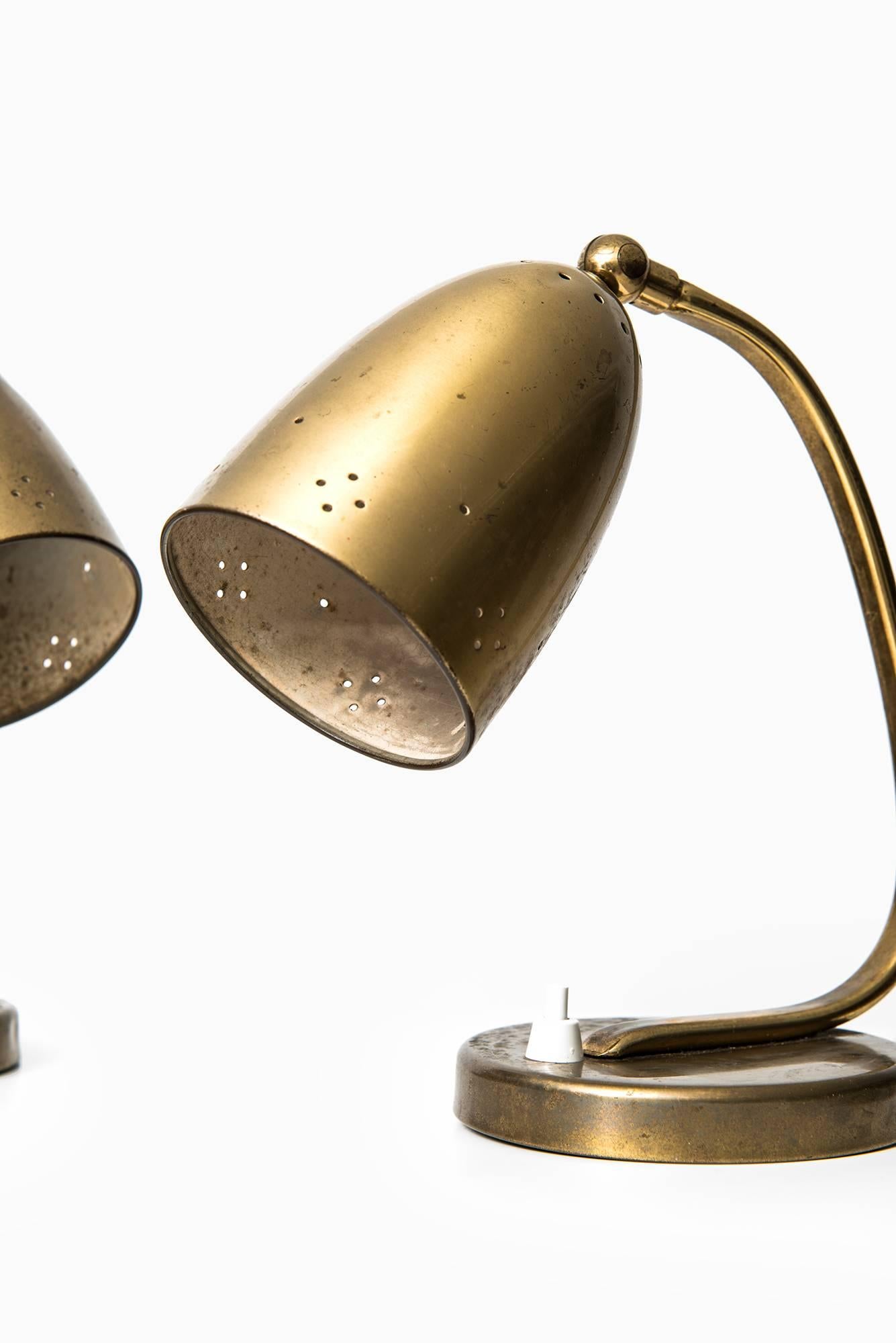 A pair of table/wall lamps produced in Denmark.