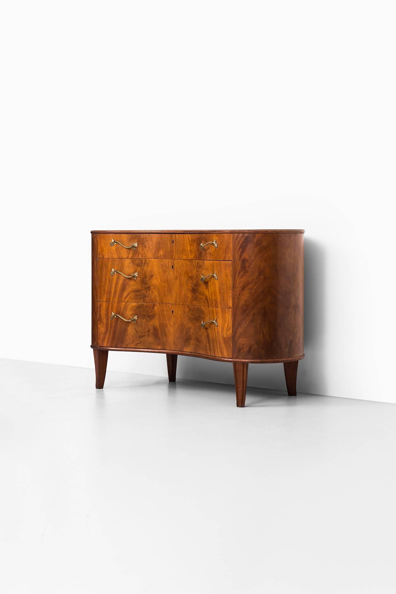 Very rare freestanding kidney shaped bureau attributed to Axel Larsson. Produced by Bodafors in Sweden.