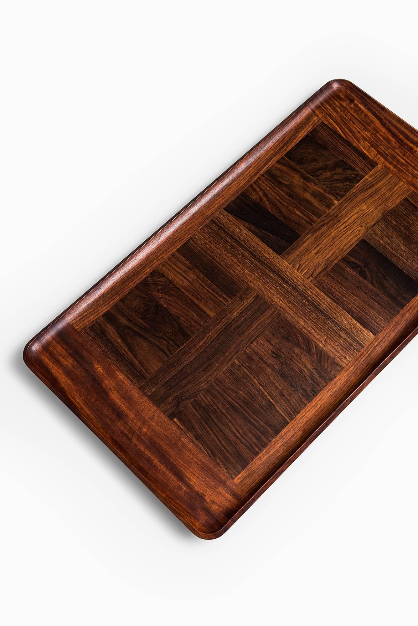 Rare large tray in cocobolo designed by Jens Quistgaard. Produced by Dansk in Denmark.