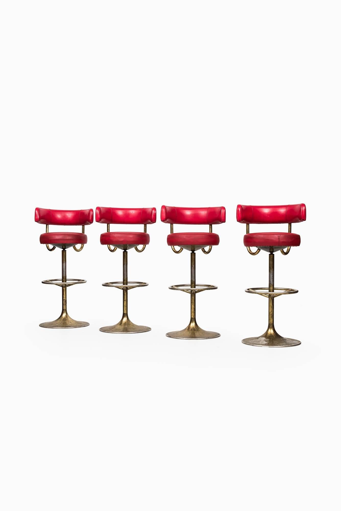 A set of four high bar stools designed by Börje Johansson. Produced by Johansson design in Markaryd, Sweden.