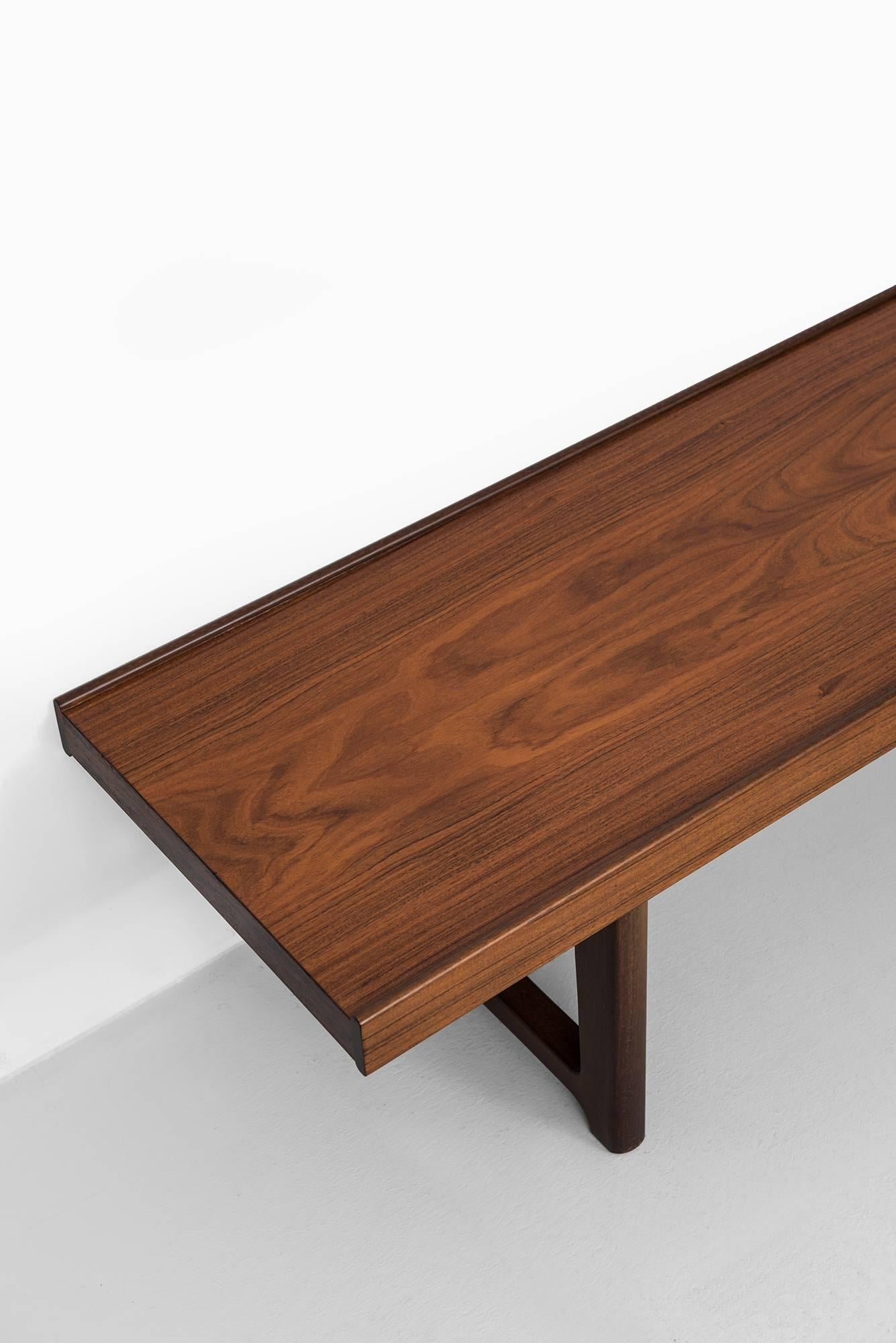 Bench/side table model Krobo designed by Torbjørn Afdal. Produced by Bruksbo in Norway.
