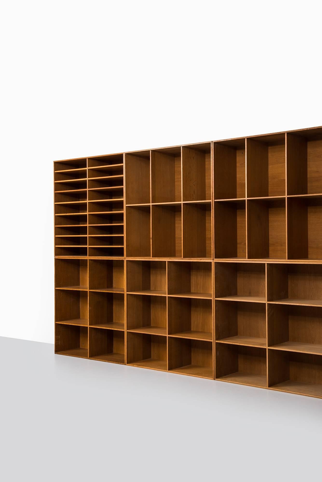 Mid-20th Century Set of Eight Bookcases Designed by Mogens Koch Produced by Rud Rasmussen
