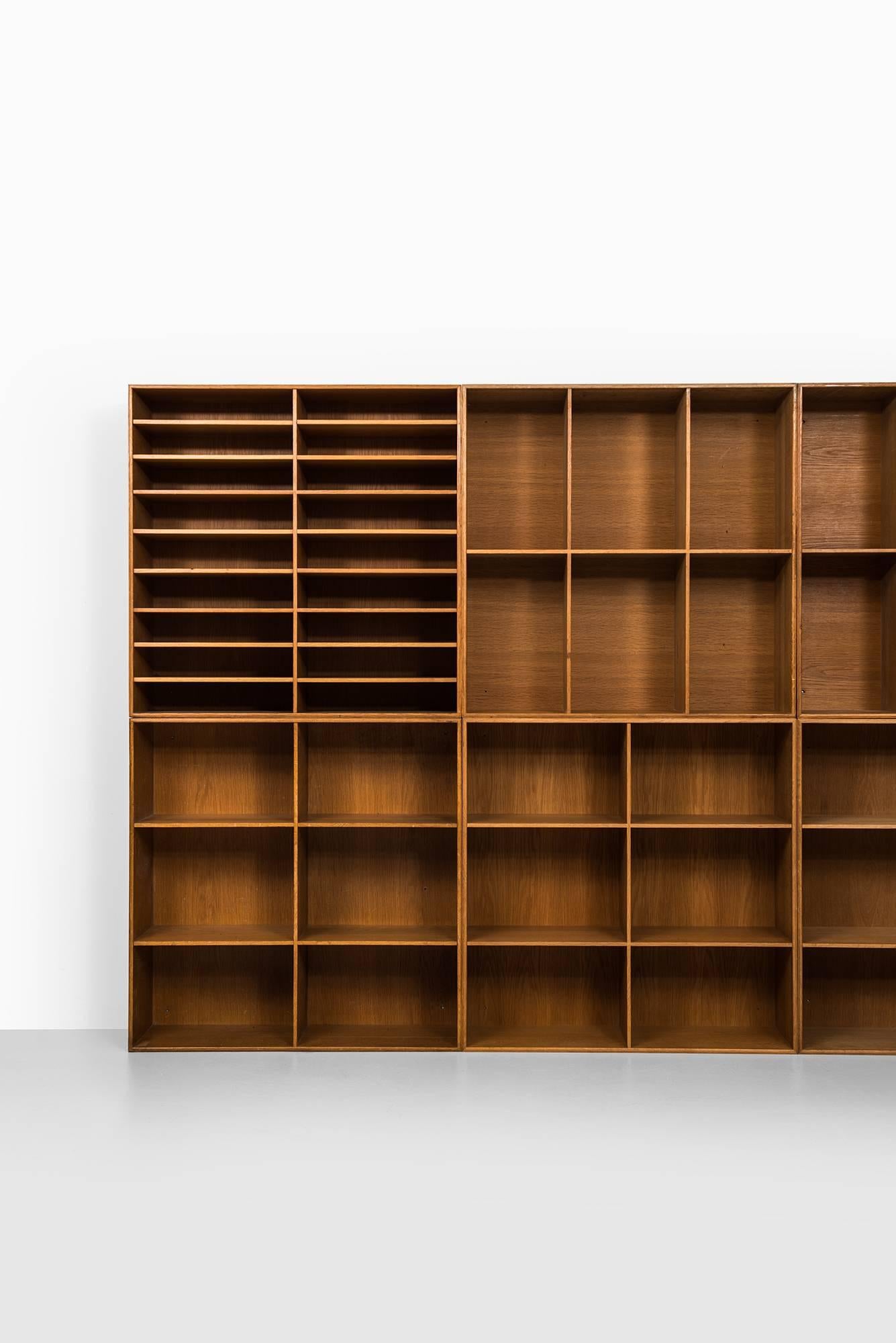Scandinavian Modern Set of Eight Bookcases Designed by Mogens Koch Produced by Rud Rasmussen