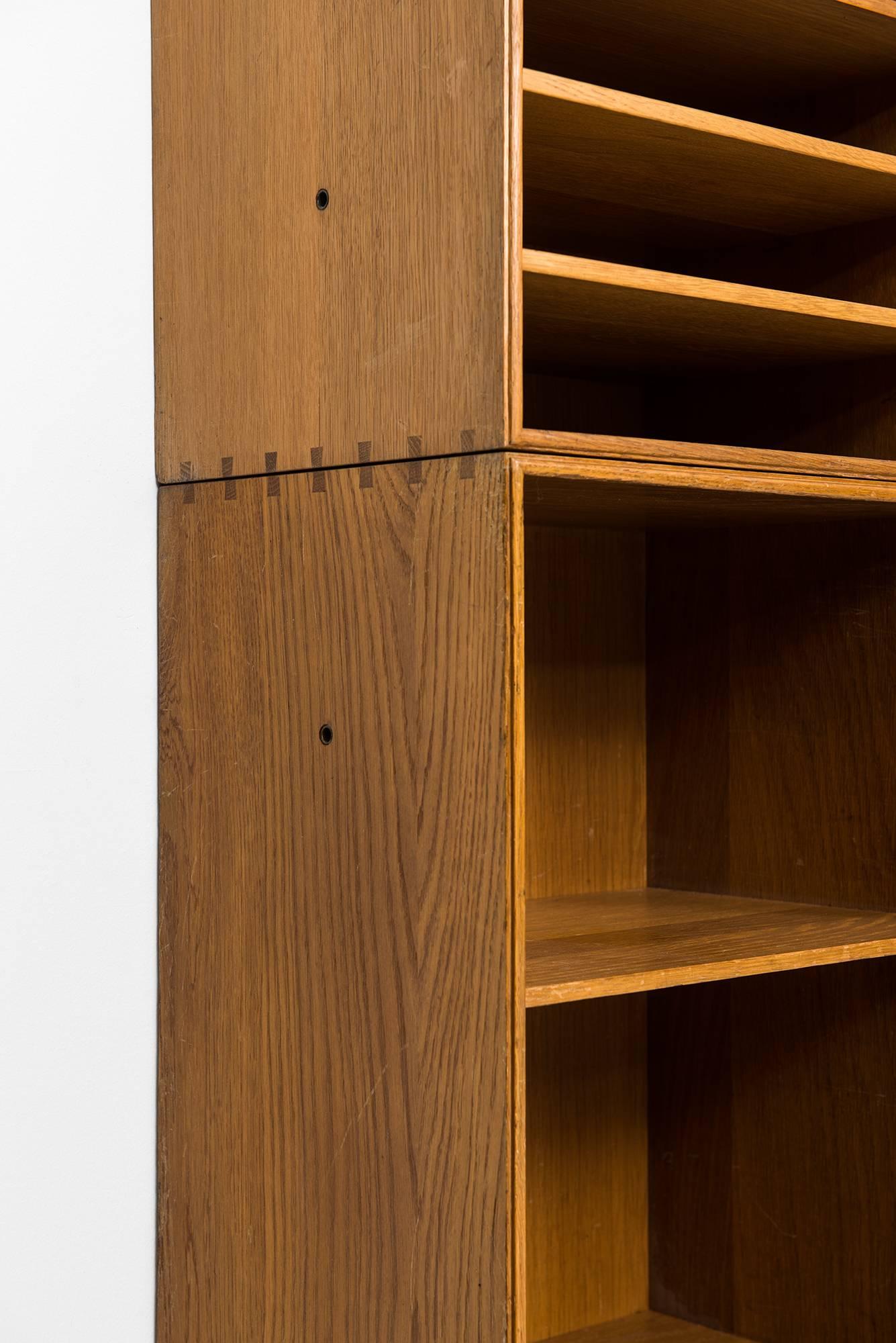 Danish Set of Eight Bookcases Designed by Mogens Koch Produced by Rud Rasmussen