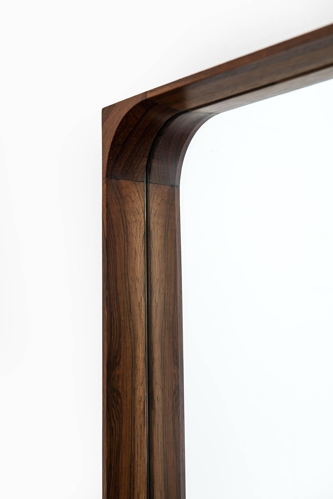 Rosewood mirror produced in Denmark