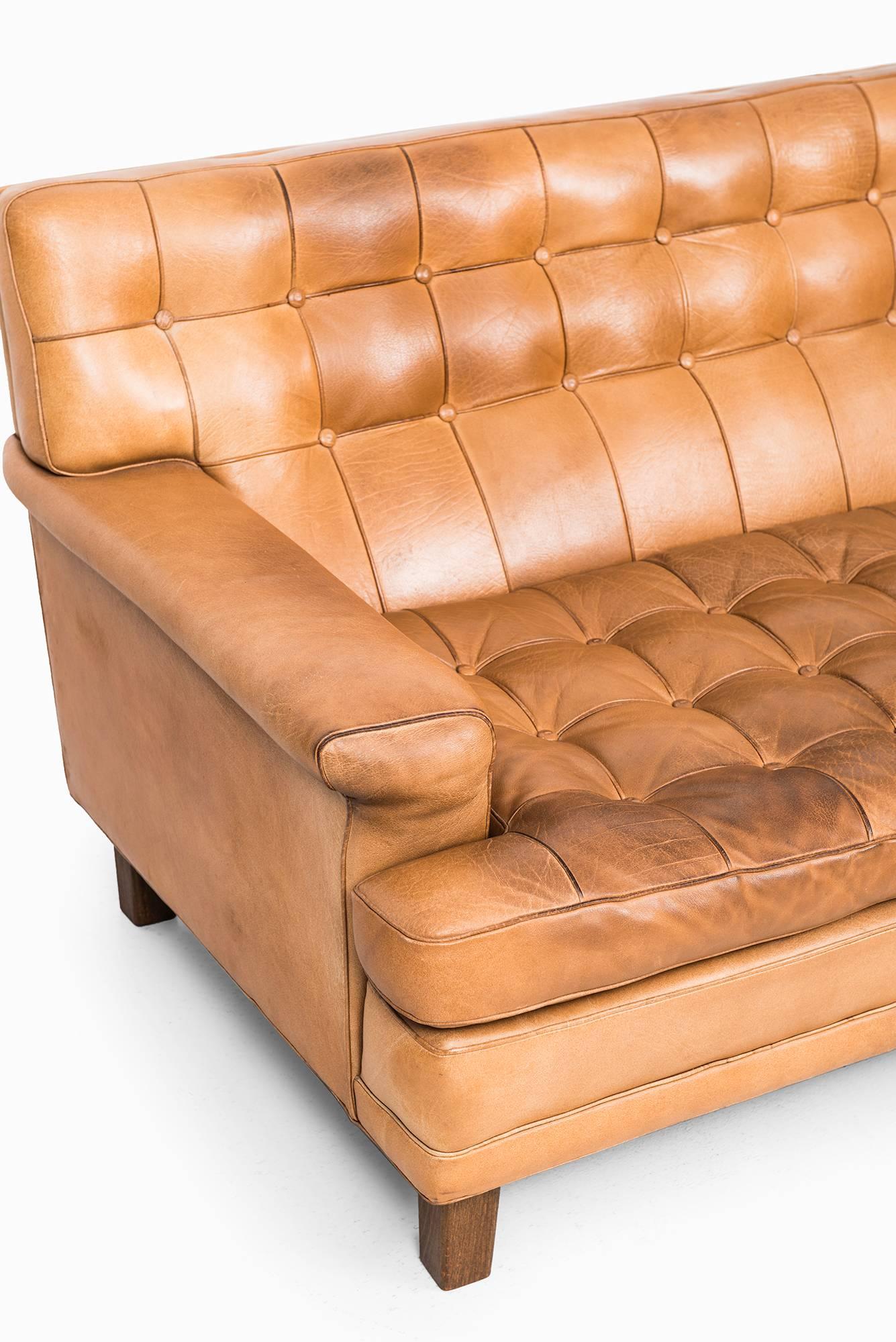 Mid-Century Modern Arne Norell Merkur sofa in cognac brown leather by Norell AB in Sweden