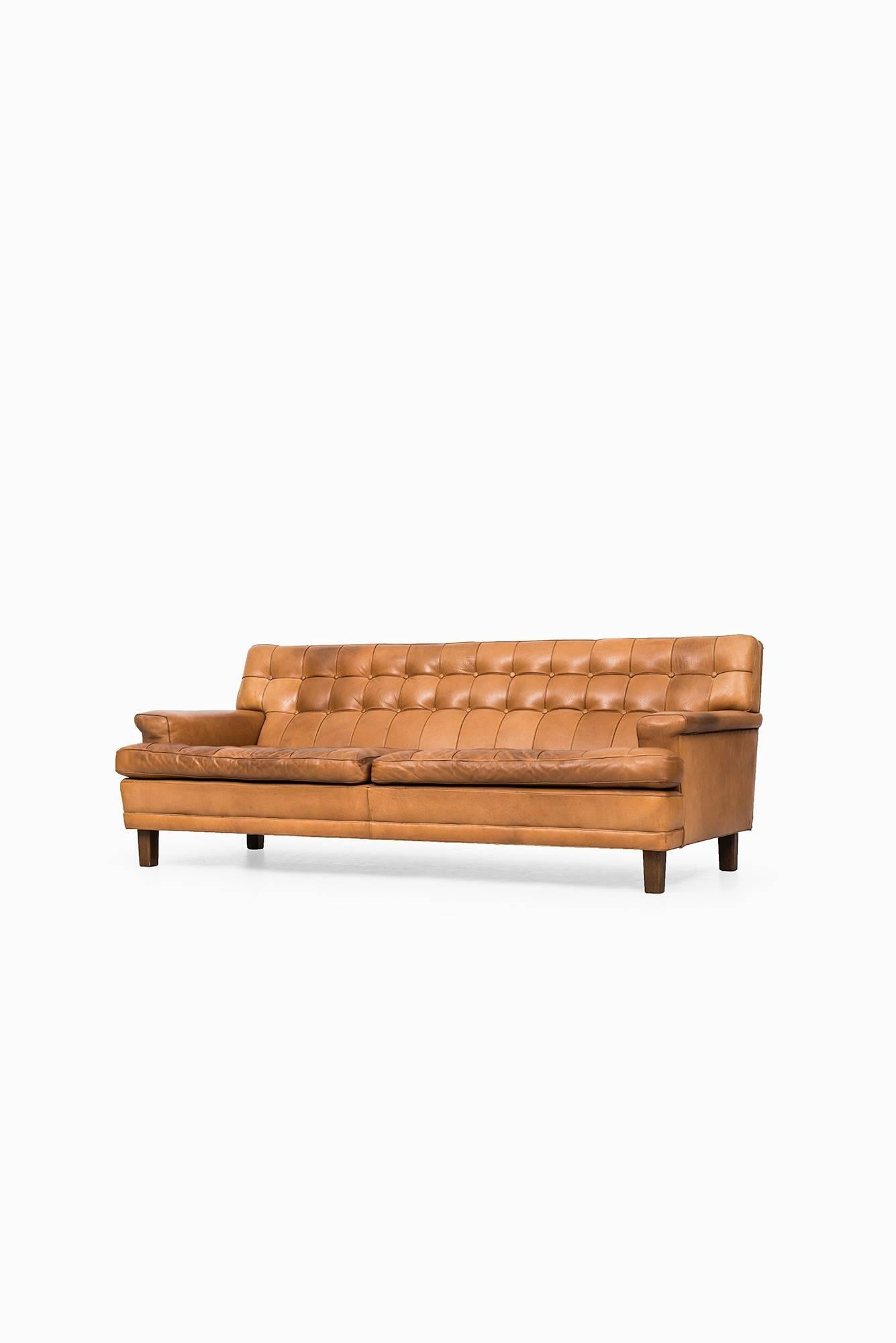 Arne Norell Merkur sofa in cognac brown leather by Norell AB in Sweden 1