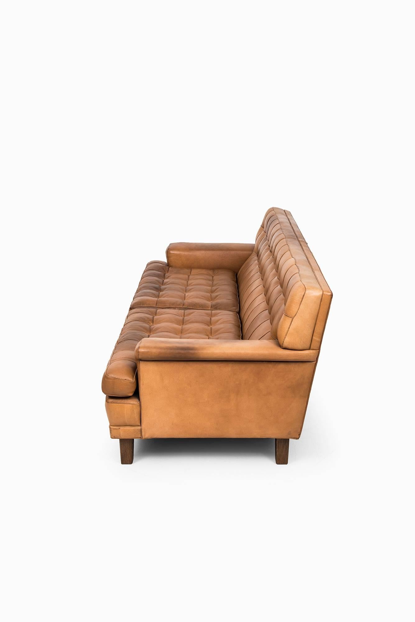 Sofa model Merkur designed by Arne Norell. Produced by Arne Norell AB in Aneby, Sweden.