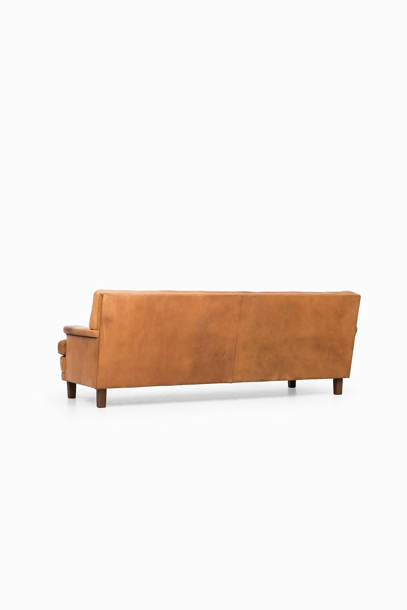 Mid-20th Century Arne Norell Merkur sofa in cognac brown leather by Norell AB in Sweden