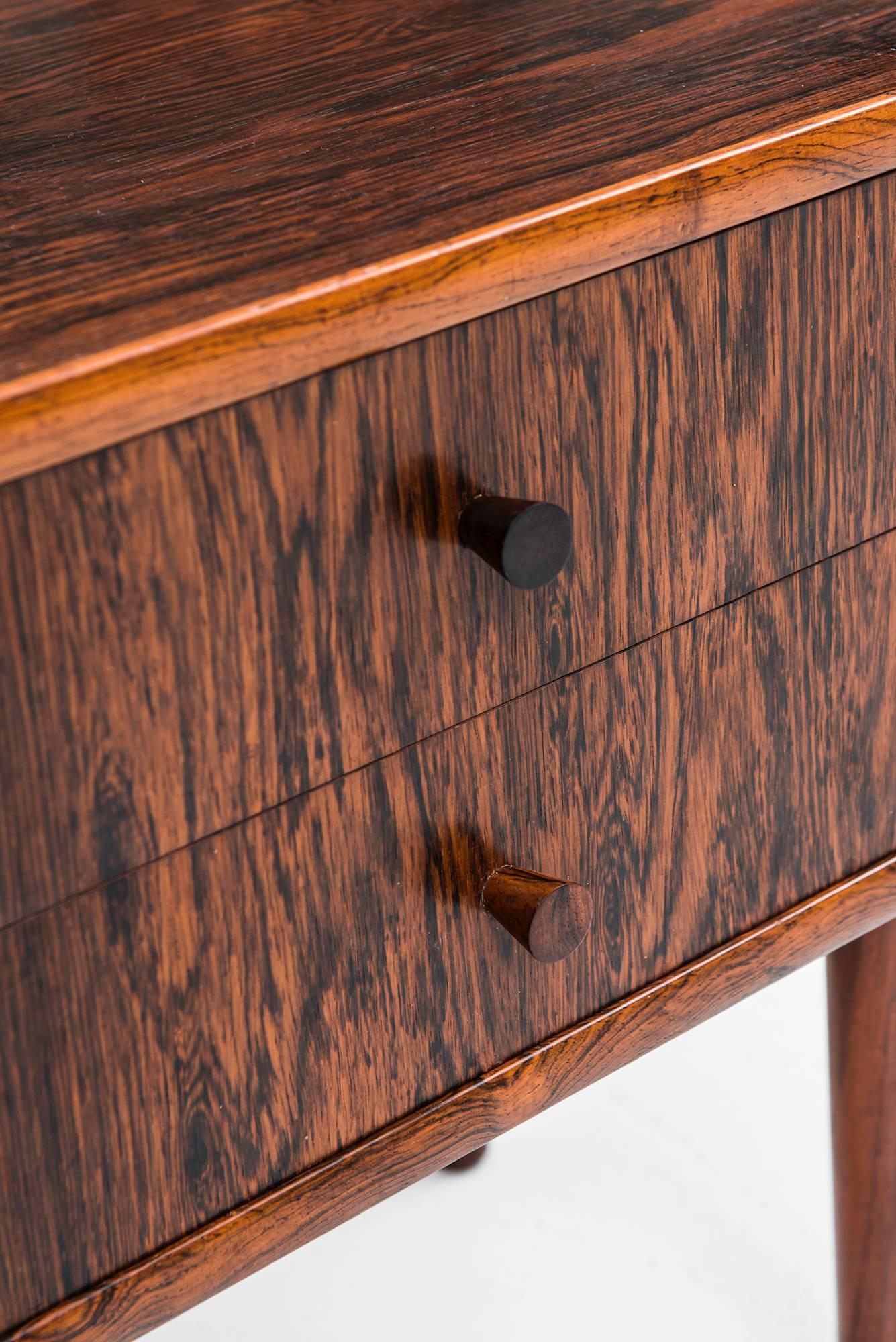 Mid-20th Century A pair of bedside tables in rosewood produced in Denmark