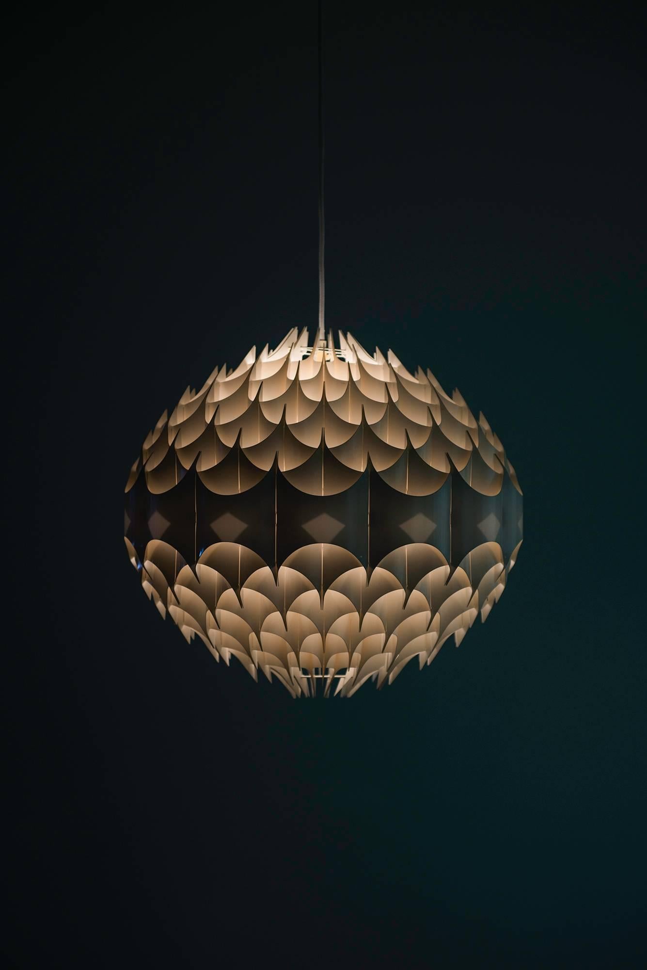 Ceiling lamp model Rhythmic designed by Havlova Milanda. Produced by Vest in Austria.