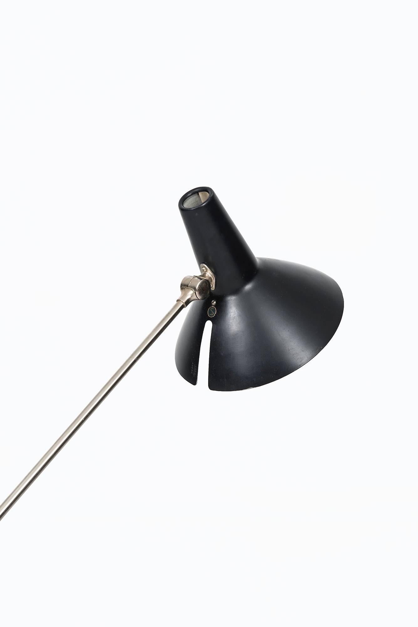 Rare adjustable floor lamp produced by ASEA in Sweden.