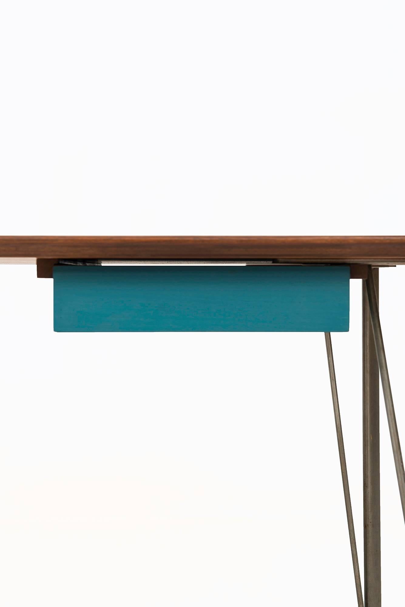 Rare desk designed by Arne Jacobsen. Produced by Fritz Hansen in Denmark.