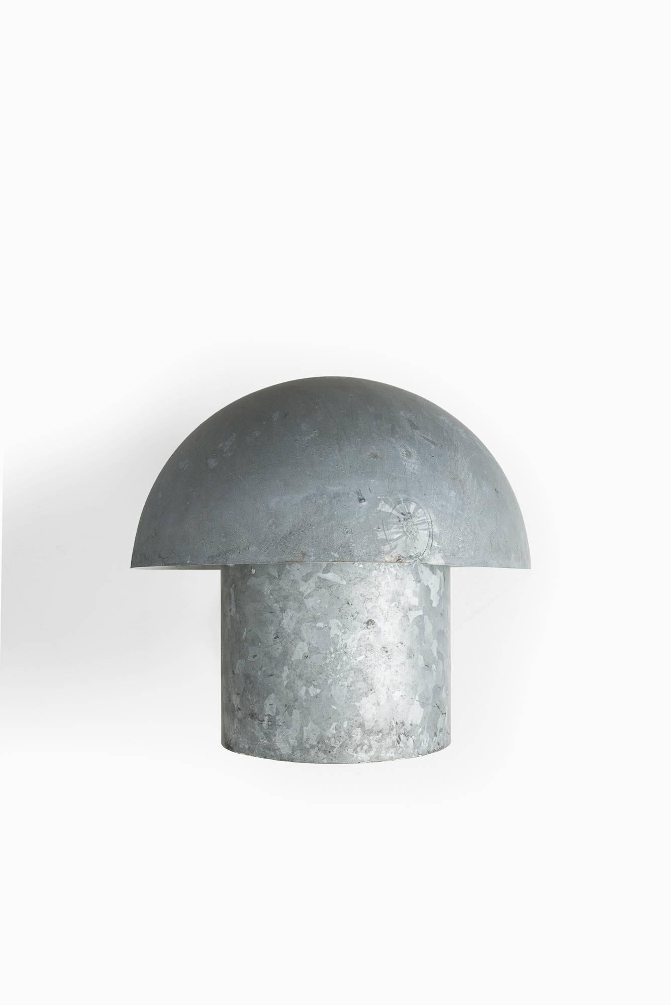 A pair of outdoor wall lamps in galvanised steel designed by Bjarne Bech. Produced by Louis Poulsen in Denmark.