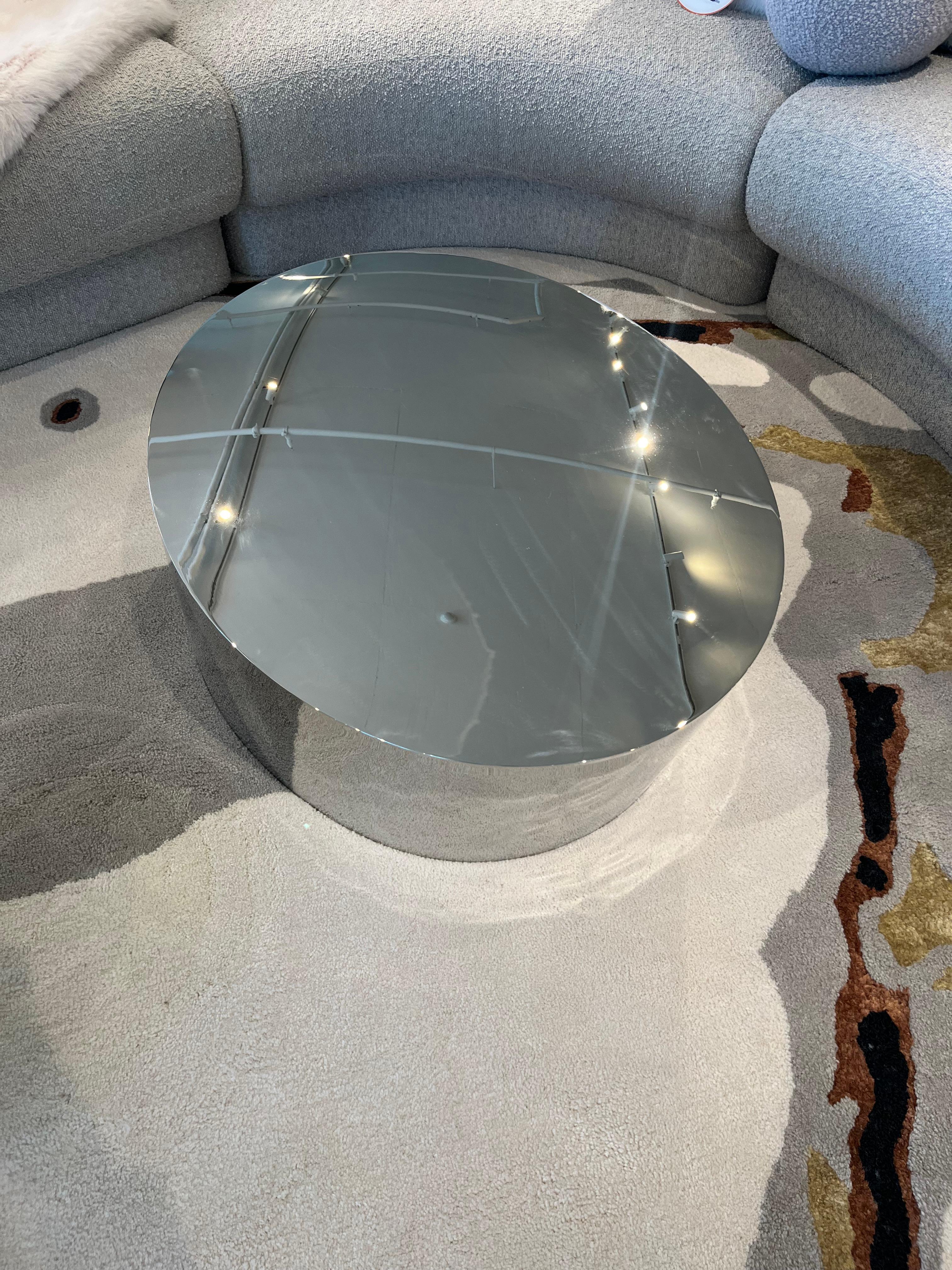 Brand new and never used, this Thayer Coggin Pisa Cocktail Table is an authentic original designed by Rick Lee. Crafted in polished stainless steel, the Pisa is a sculptural, statement-making drum table that brings both function and high-design