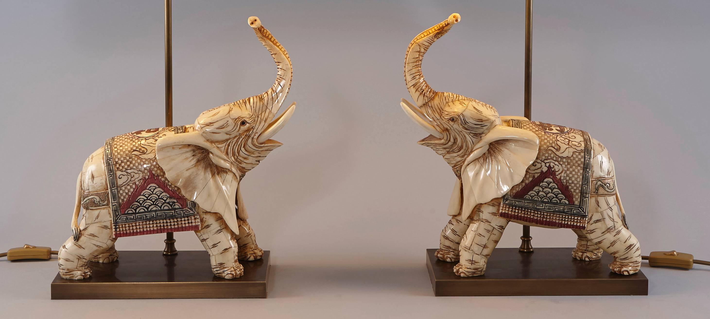 Pair of Bone Elephants as Table Lamps on a Brass Base .

