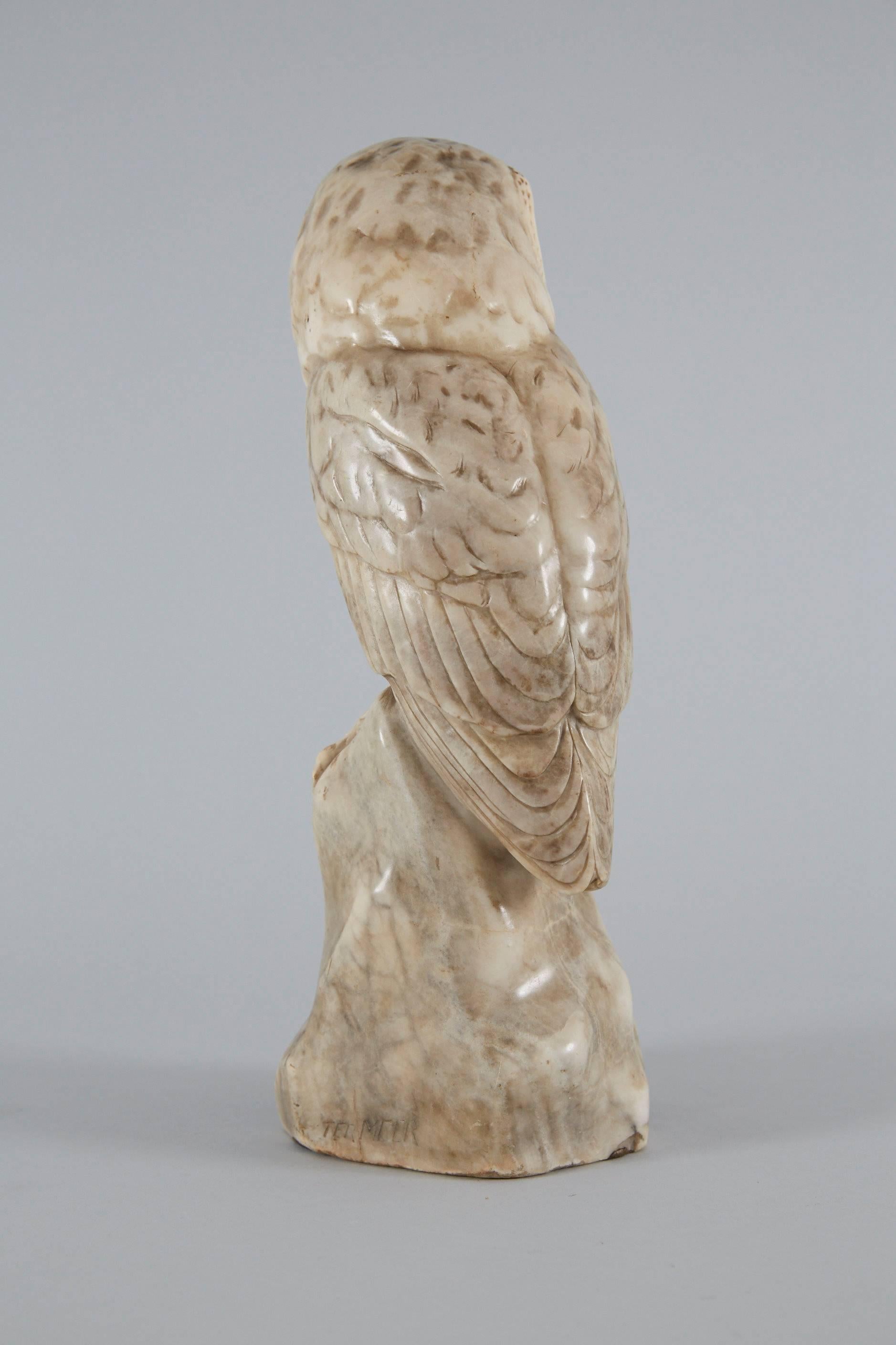 Sculpture of an alabaster owl. Marked on the stand in a metal badge Hofkunstanstalt Kochendörfer München.