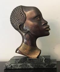 Bookends in the Style of Hagenauer Bust of an African Woman and Man
