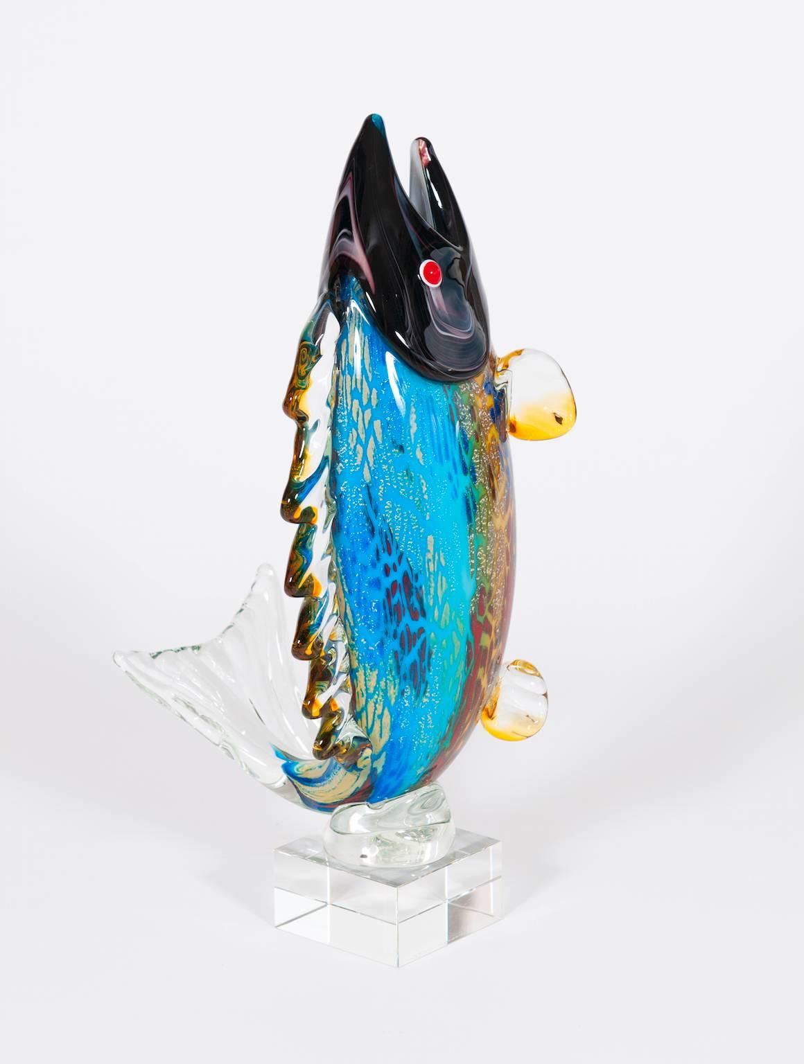 Amazing Italian Murano glass fish sculpture in transparent and multicolor, signed by Toso Murano, circa 1970s. The sculpture is a very accurate reproduction of a fish, the artist have spent many time for create it, with full true particulars of a