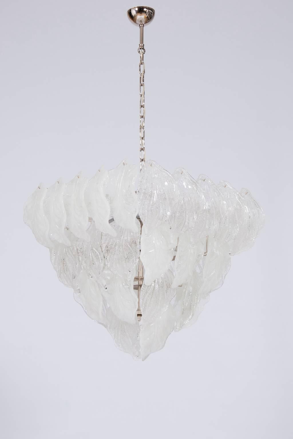 Transparent leaf details in Murano glass grace this 1970s Italian Flush Mount.
A special Italian Venetian Flush Mount, crafted from blown Murano glass and designed in the shape of a diamond with elegant transparent and white grit glass leaves,