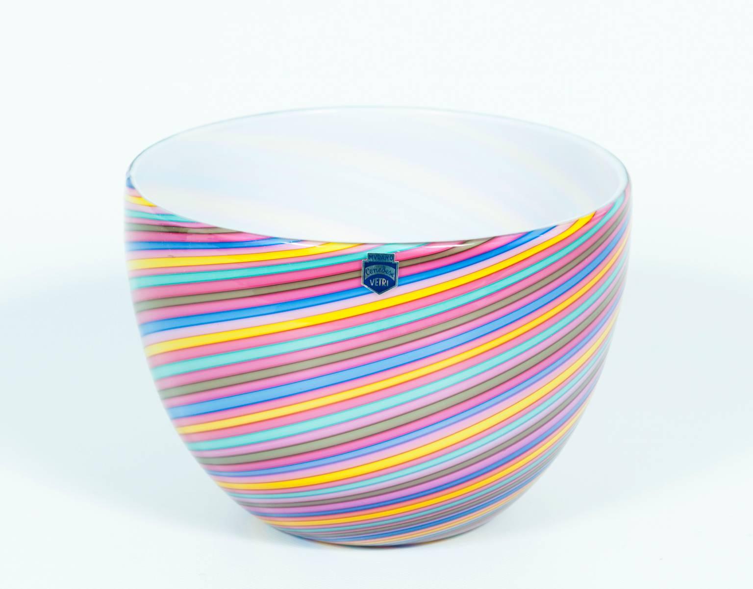 Elegant Italian Murano glass bowls with multicolors twisted stripes, in very excellent original condition with the original label of the maker. Made circa 1970s by glassmaker Cenedese and signed in the bottom. The bowls are 6.30 inch high, by 8.27