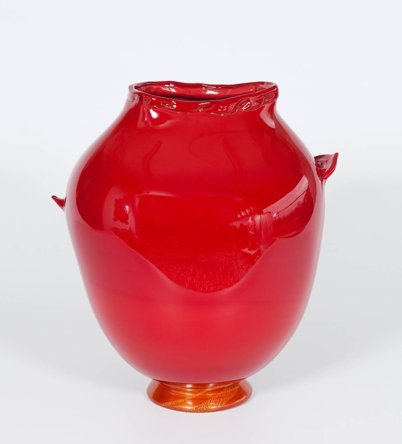 Italian Venetian, Handcrafted Vase, Blown Murano Glass, Red & Gold finish, 1980s
This is a unique and gorgeous vase, having a special irregular shape, entirely handcrafted in blown Murano glass. The most special detail, that makes this fantastic