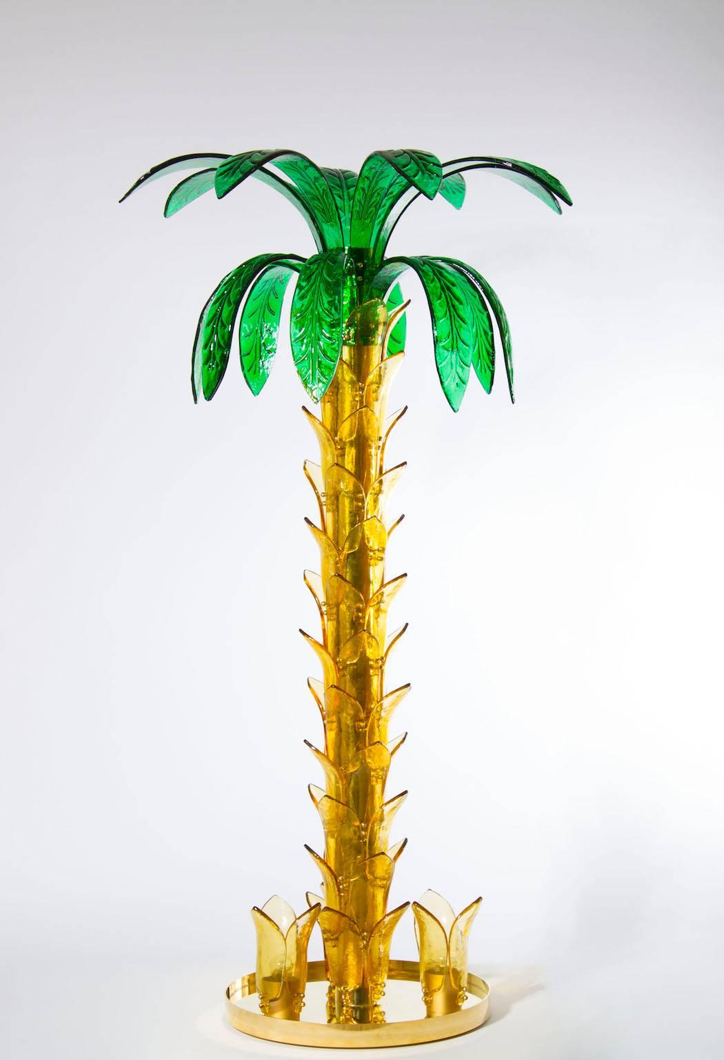 Very massive elegant Italian Palm in Murano Glass amber and green, composed by a circular brass frame with three bushes of glass having amber leafs with inside a light, the stem is composed by amber leafs, with above a bushes composed by low and