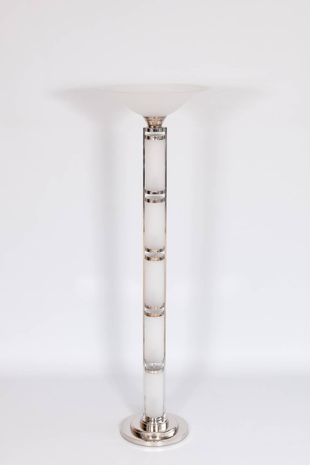 Elegant Italian Sandblasted Murano Glass Floor Lamp Circa 1970s
This refined floor lamp was entirely handcrafted in the Venetian island of Murano in the 1970s using the ancient local glassmaking techniques. This work of art is made of four glass