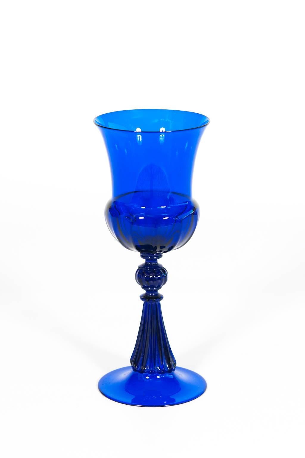 Elegant Italian Venetian handblown goblet in Murano Glass blue with many particular details, and with a beautiful shape. The goblet was made in the Murano Island, circa 1980s, now is in the same perfect original conditions.