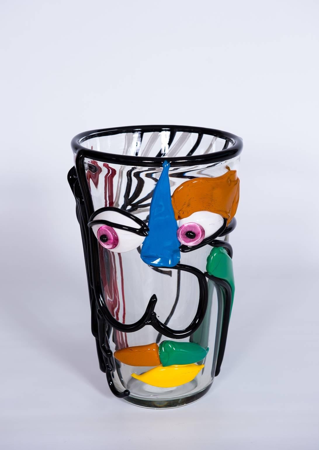 Amazing Italian Venetian Vase in Murano glass transparent with multi-color refinished, with a Picasso face style represented on the vase in a unique and elegant style. Attributed to Cenedese, circa 1970s and entirely realized handcrafted and
