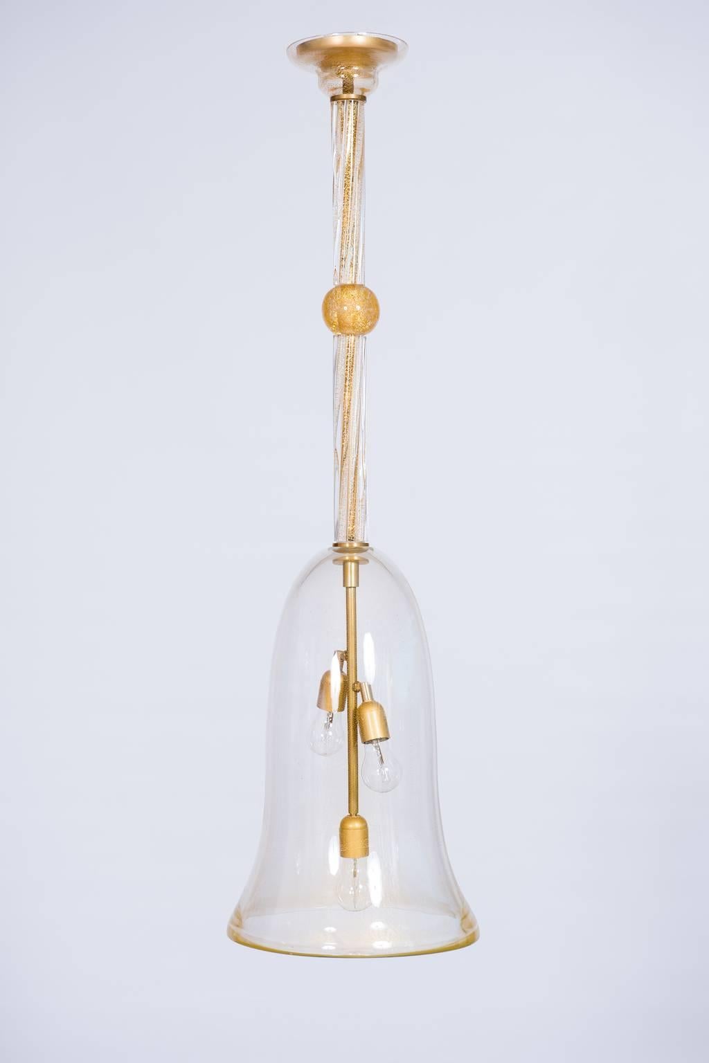 Gorgeous, and unique, Italian Venetian,  Flush Mount, Blown Murano Glass, Transparent & 24k Gold, 21st century.
This is a unique design Vintage Murano Gallery Flush Mount, having a bell shape, composed by a  long twisted gold stem, and a massive