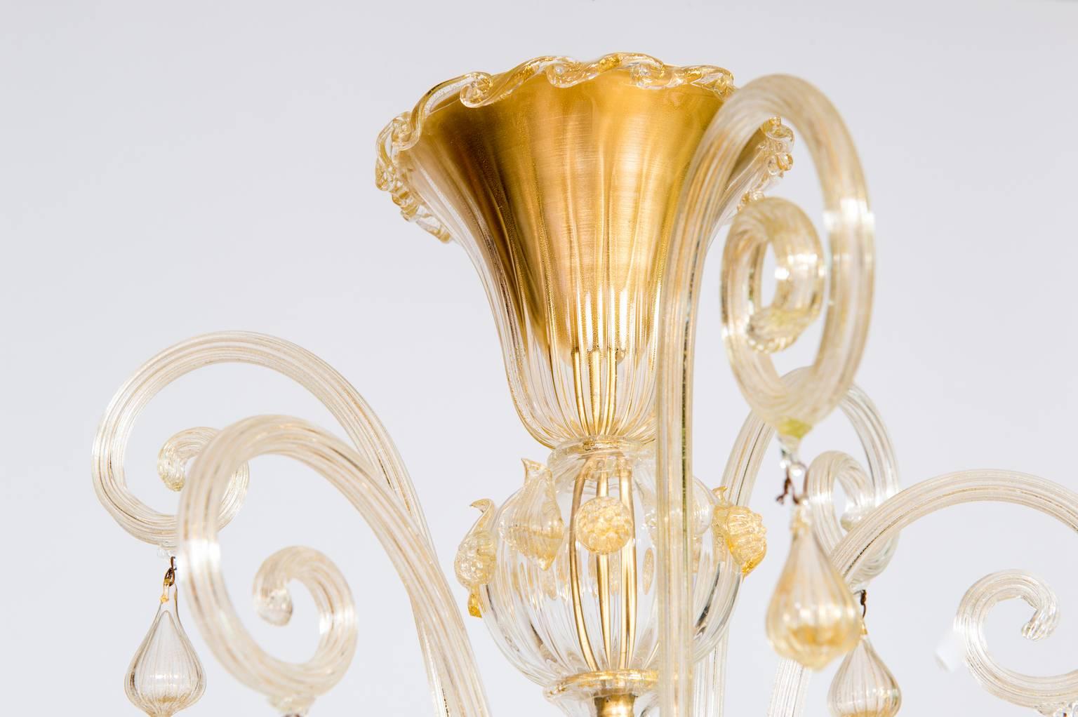 Art Deco Italian Chandelier in Gold and Blown Murano Glass, Big Bells and Pendants 1970s For Sale