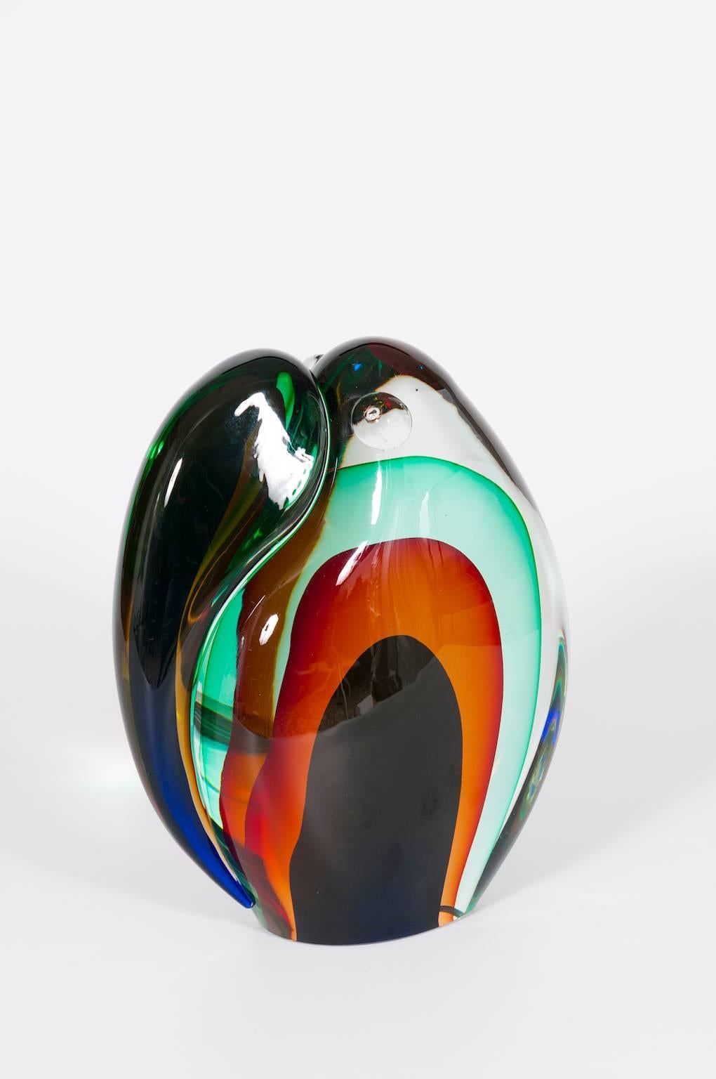 Romano Donà 1990s Multi-Color Murano Glass Toucan Sculpture Venice Italy.
Behold a captivating masterpiece, a testament to the enchanting artistry of Murano, Italy. This remarkable toucan sculpture, crafted from multi-color Murano glass in the 1990s