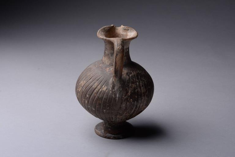 Ancient Cypriot Geometric Black Slip Ware Jug, 950 BC at 1stdibs