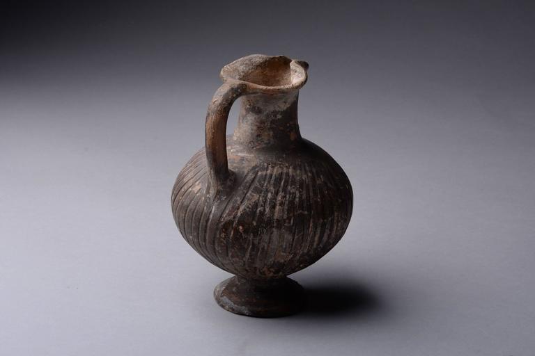 Ancient Cypriot Geometric Black Slip Ware Jug, 950 BC at 1stdibs