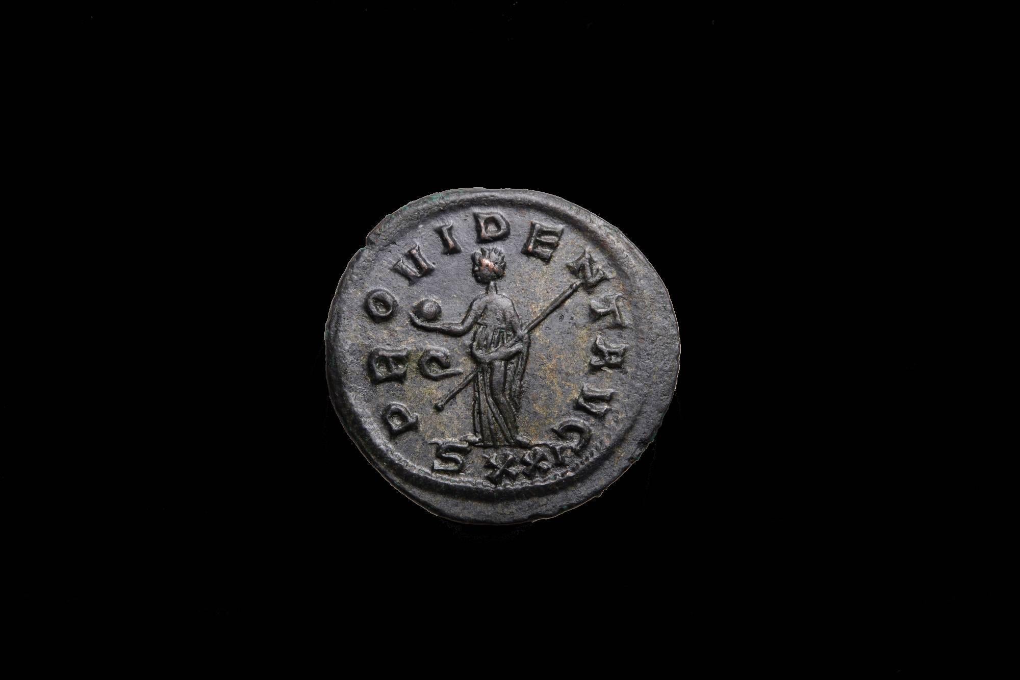 A beautiful ancient Roman antoninianus, minted under Emperor Probus, (Marcus Aurelius Probus Augustus). Struck, circa 280 AD, at the Ticinum mint.

The obverse with a fine bust of Probus, shown wearing an ornate mantle, radiate crown and holding
