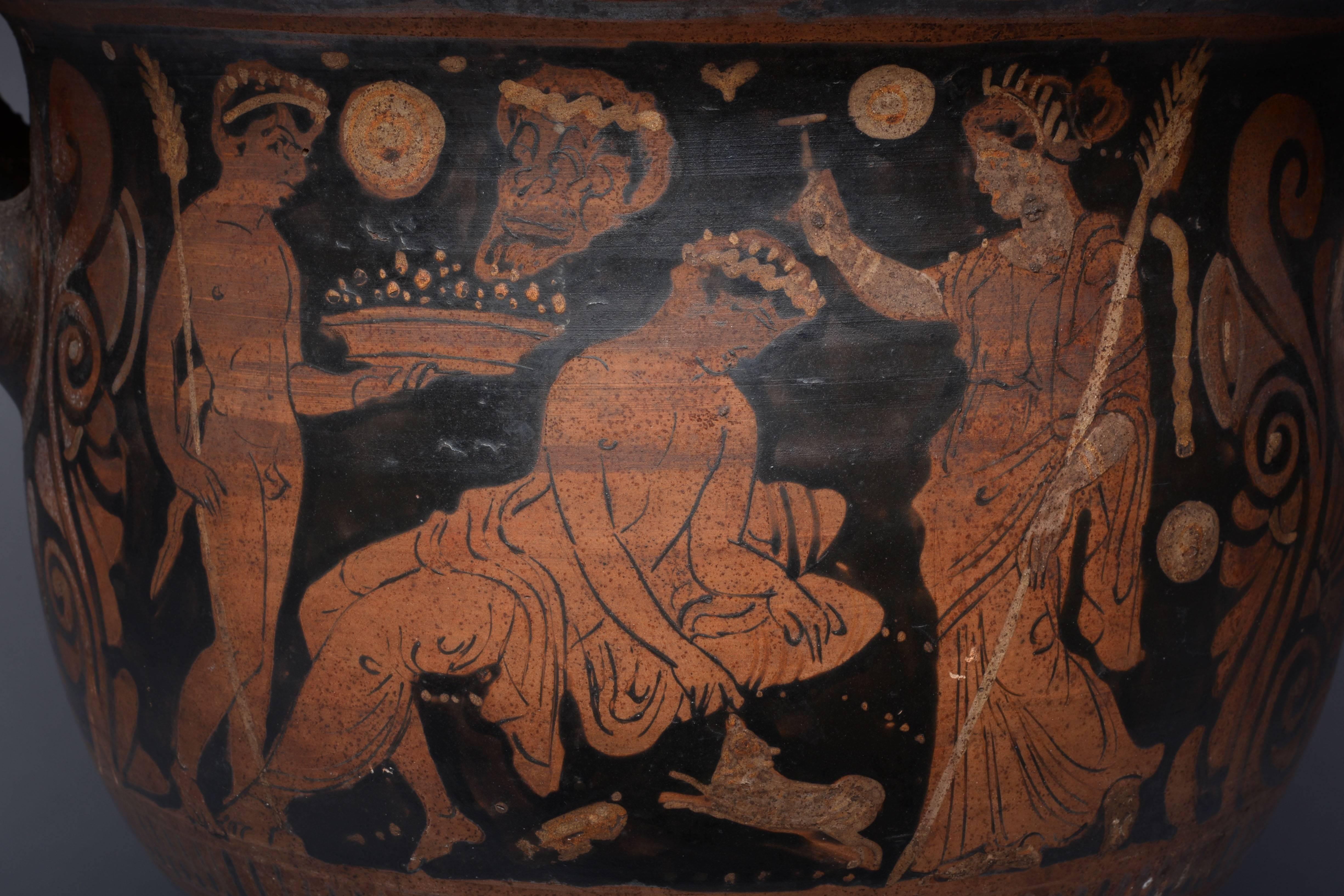 A large and well decorated ancient Greek South Italian Bell Krater depicting a Dionysiac scene, dating to circa 350 - 300 BC.

On one side there is a reclining muscular figure, his right hand playing lovingly with a dog. In front of him stands a