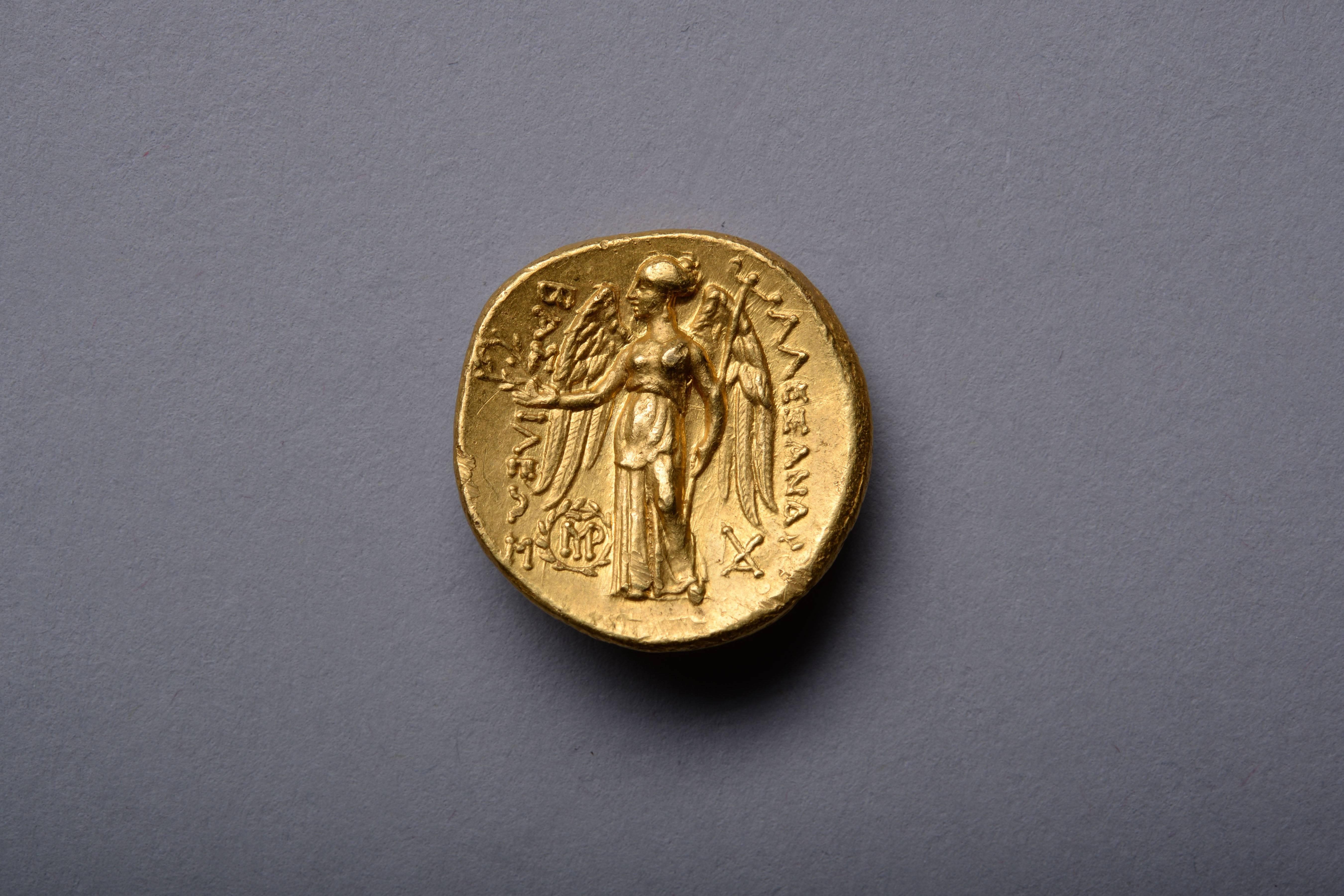 A gorgeous example of one of the most desirable ancient Greek coin types, with an exceptional pedigree.

A solid gold ancient Greek stater minted in the name of the greatest military leader of antiquity, King Alexander the Great of Macedon. This