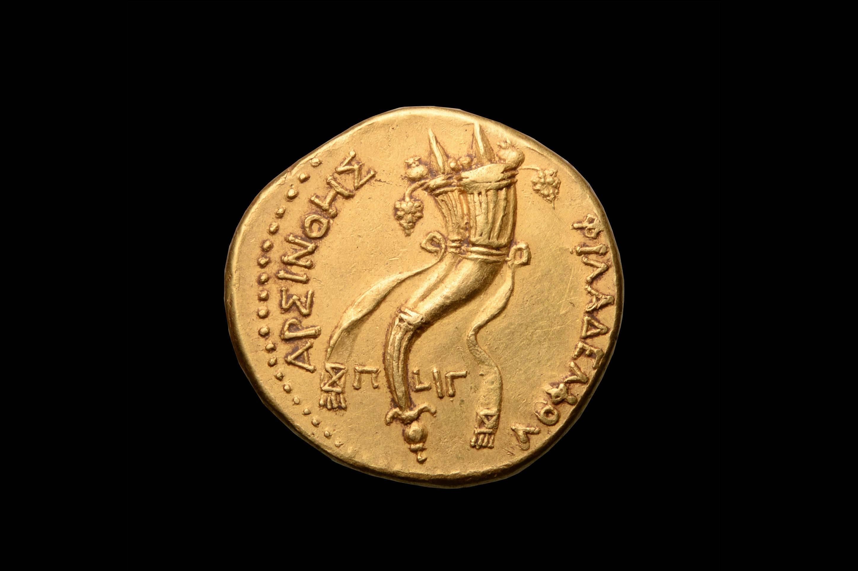 A unique, extremely fine, solid gold Octadrachm or Mnaïeion, the most valuable and heaviest gold coin struck in all antiquity. Minted around 253 BC by King Ptolemy II of Egypt in the honour of his Queen, Arsinoe II Philadelphus.
 
The obverse
