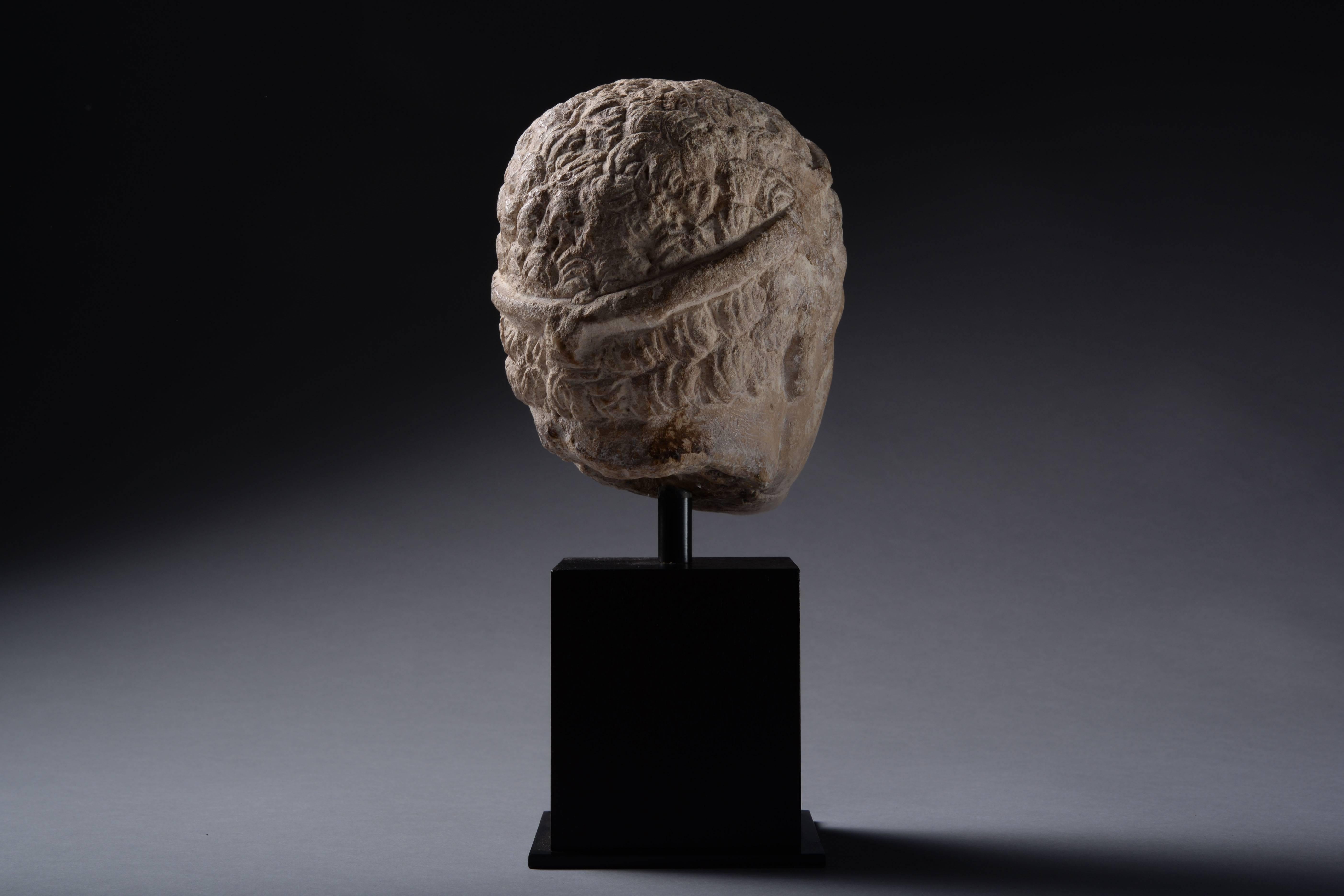 Carved Ancient Cypriot Limestone Head, 350 BC