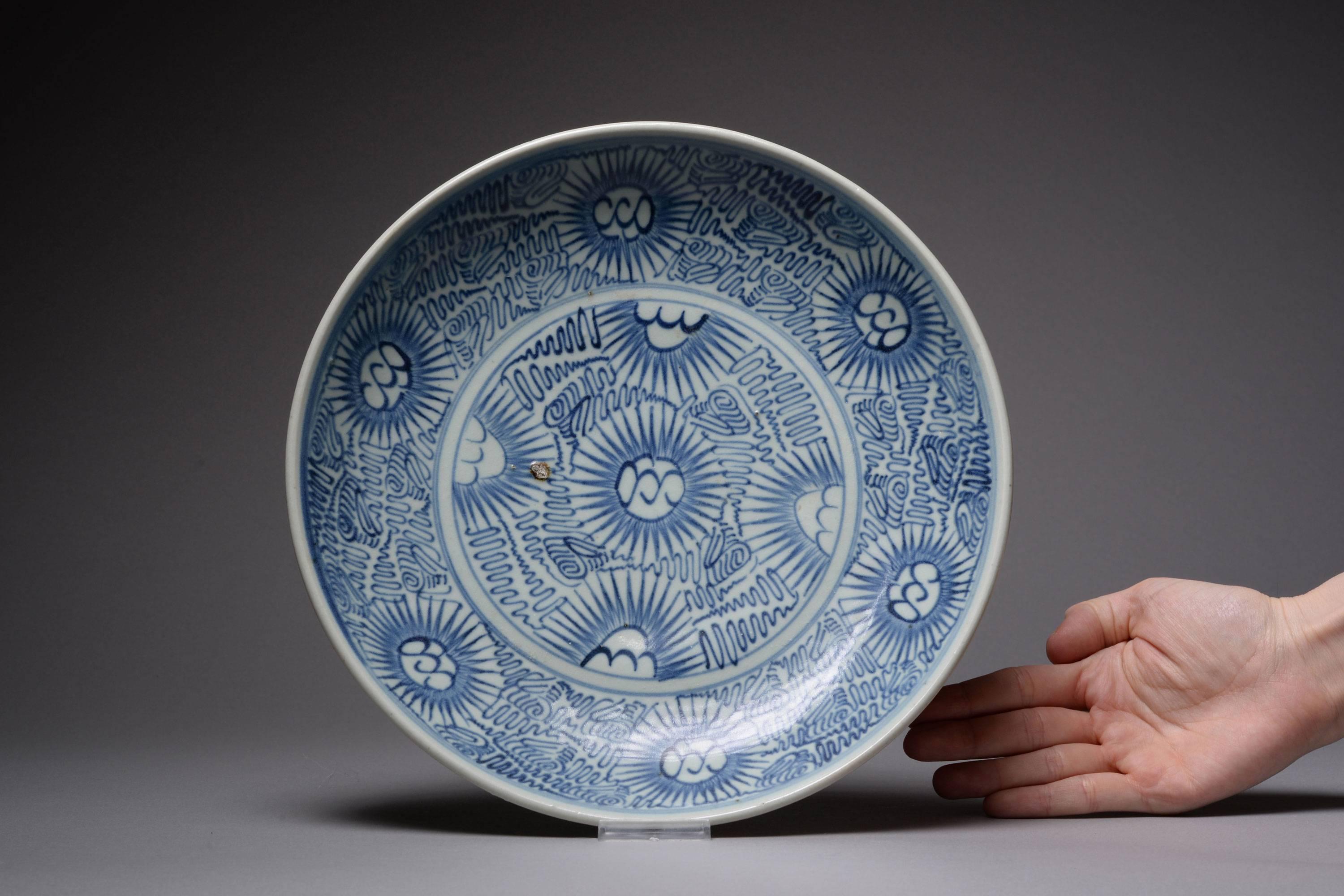 A superb, large and extremely decorative antique Chinese blue and white porcelain charger or presentation dish. Salvaged from the Diana cargo shipwreck and dating to 1817. Sold at Christie's, March 1995.

Profusely decorated in vibrant blue on a