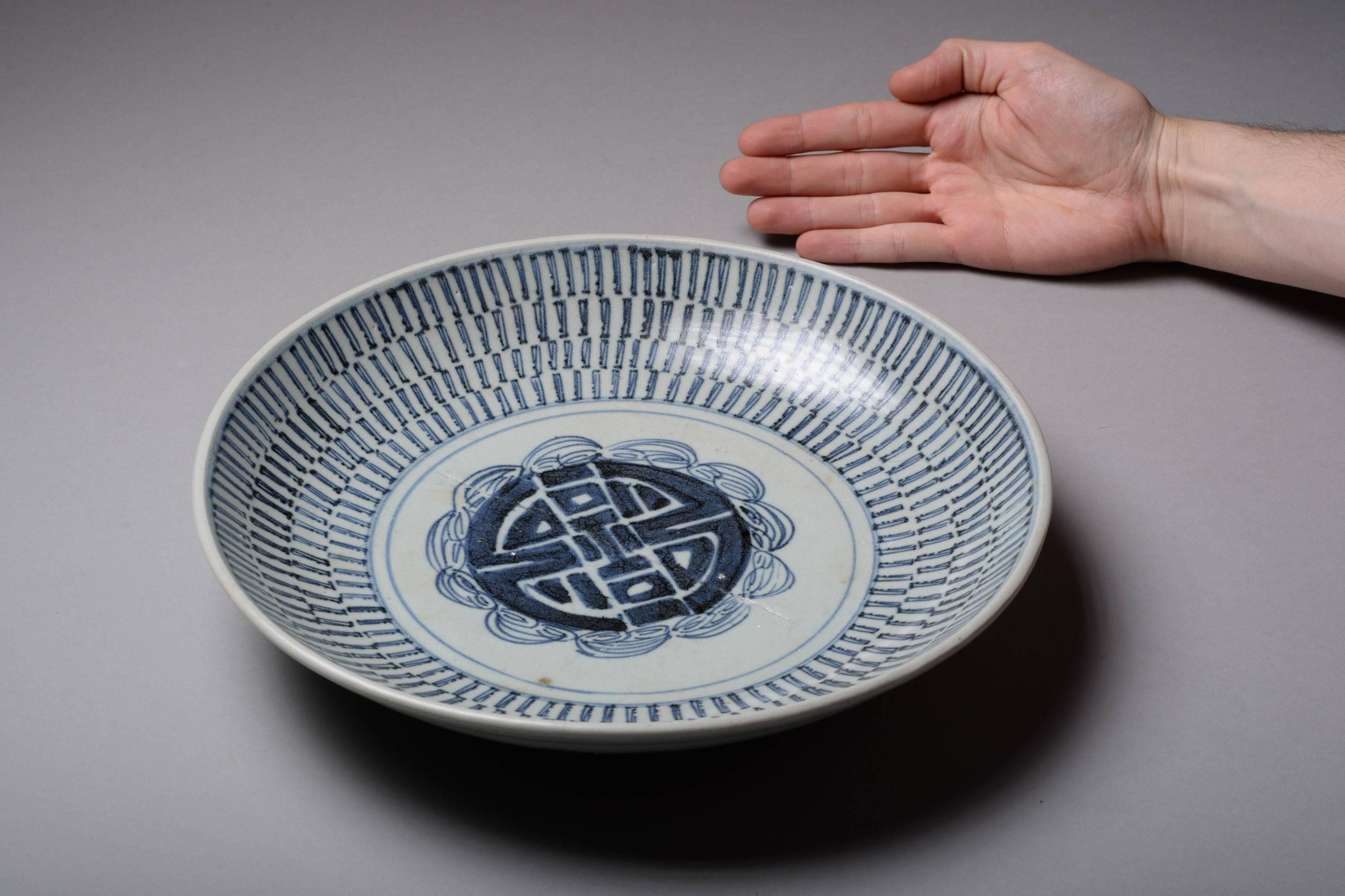 A superb, large and extremely decorative antique Chinese blue and white porcelain charger or presentation dish. Salvaged from the Diana cargo shipwreck and dating to 1817. Sold at Christie's, March 1995.

Profusely decorated in vibrant blue on a