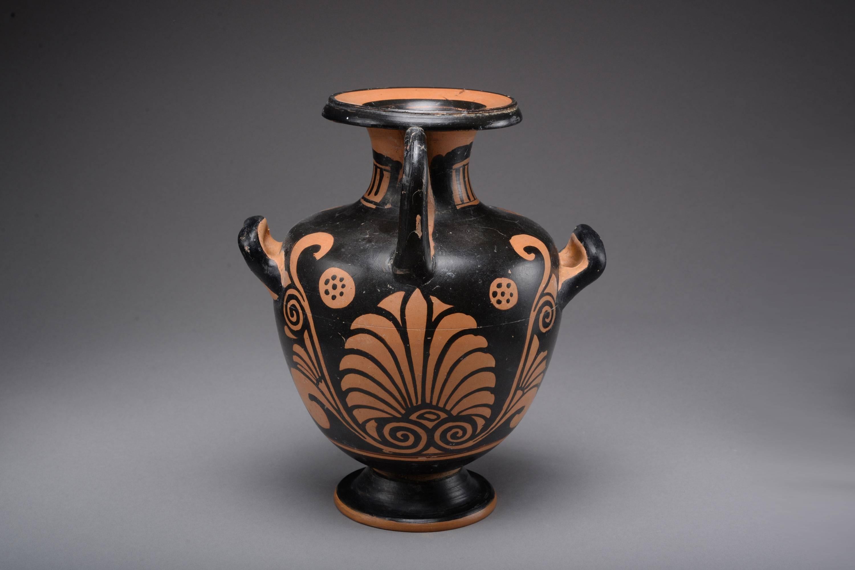 A beautiful, rare and well provenanced ancient Greek, Paestan Red-Figure Hydria (water carrying vessel), dating to the mid-4th century BC and attributed to the painter of the Louvre K 236.

The hydria is decorated with a beautiful seated lady of