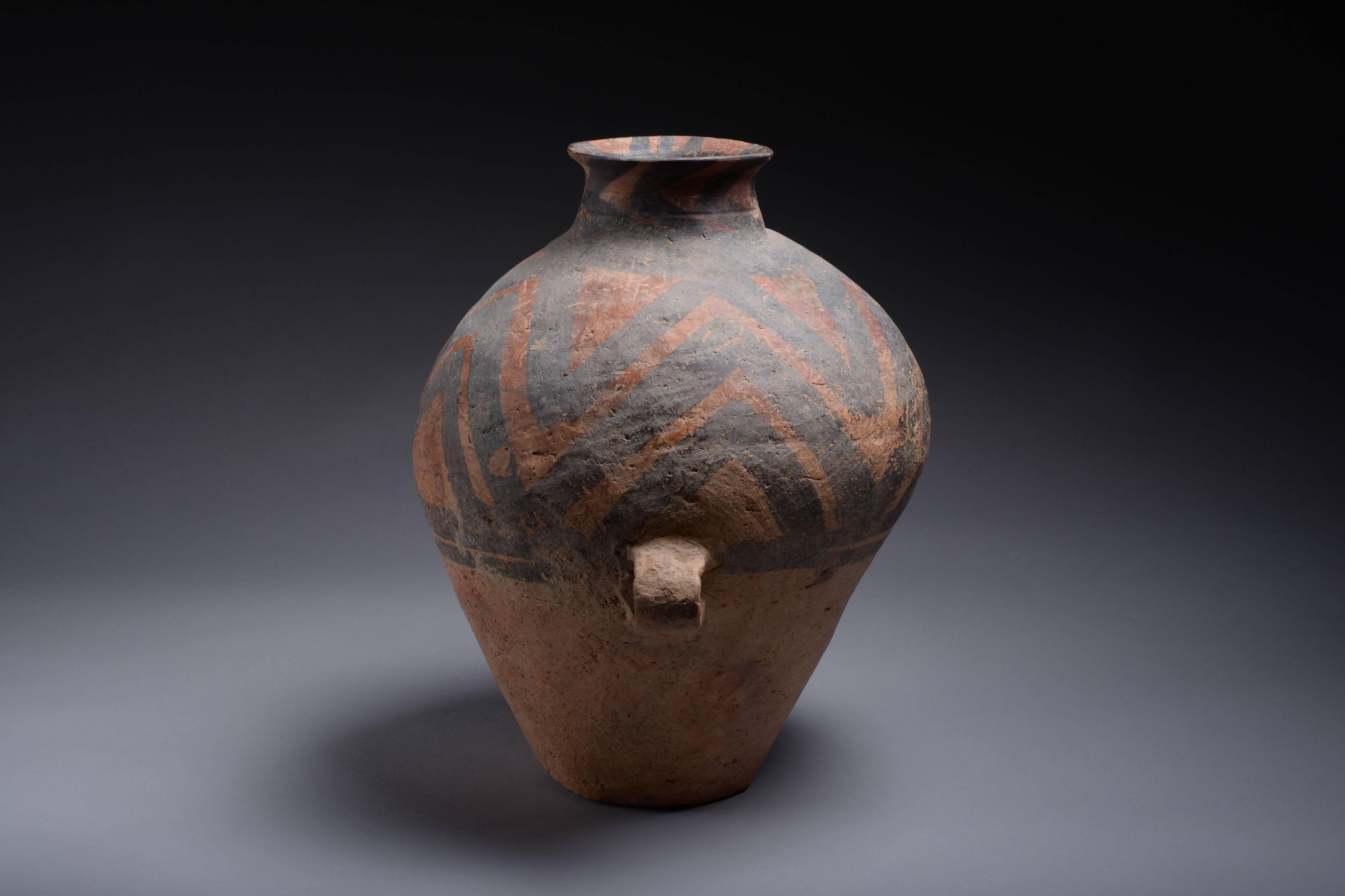 A large ancient Chinese Prehistoric terracotta amphora, dating to circa 3000 BC.
 
This attractive earthenware vase dates to the Majiayao phase of China's Yangshao culture. It is of typical form, with bulbous body, flaring neck and strap handles.
