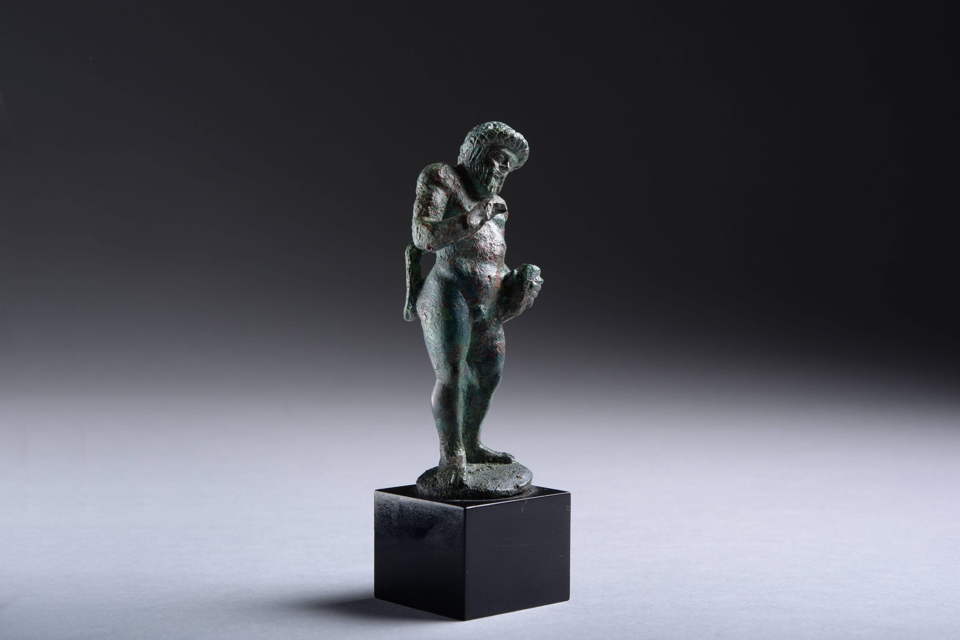 An Etruscan bronze statuette of a drunk satyr, dating to the 5th century BC.

The figure is shown with an unsteady gait, inebriated after drinking the contents of his Horn cup! Well modelled with musculature, bushy tail, beard and long moustache,