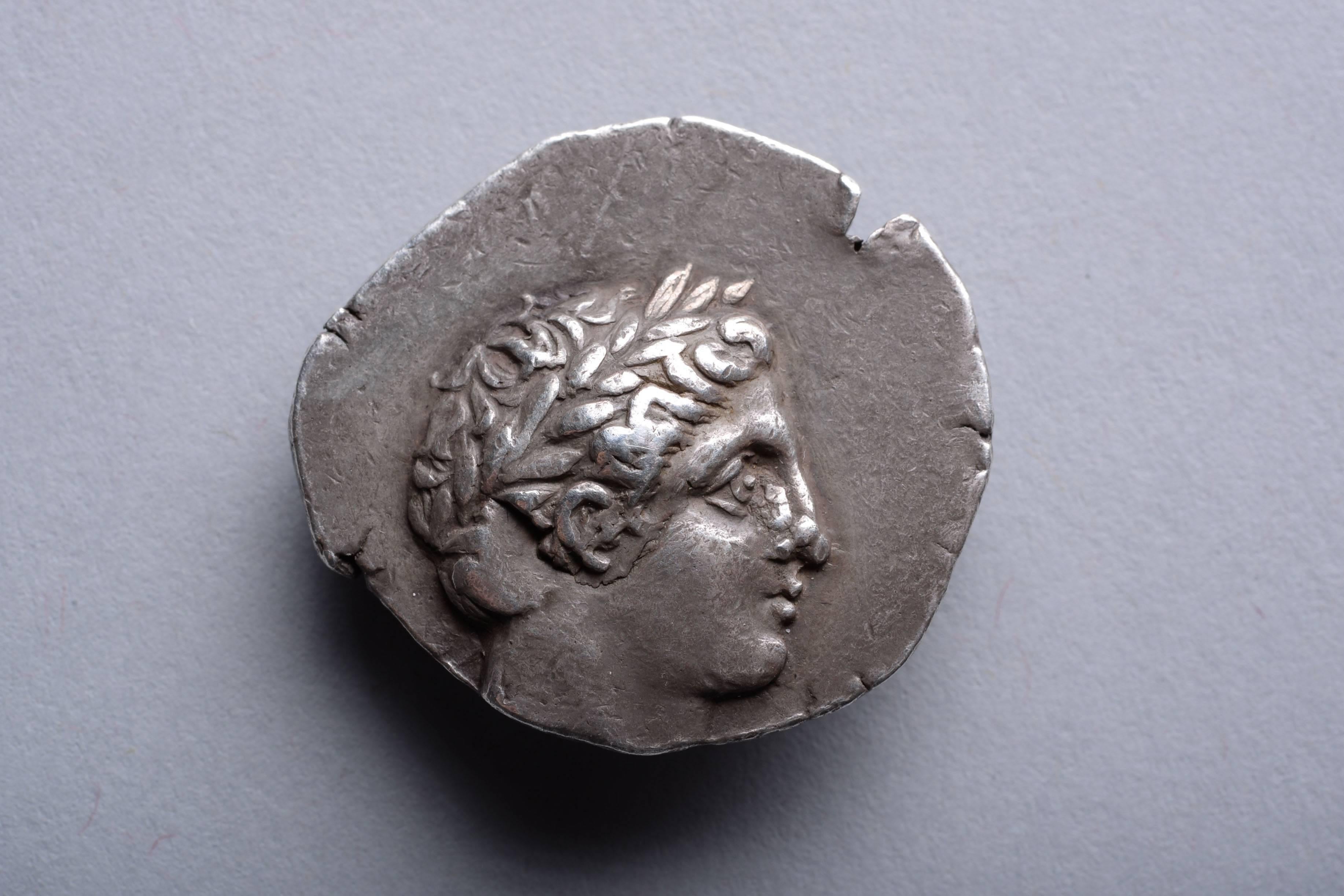 A silver tetradrachm minted under King Patraos of Paeonia, circa 335-315 BC.

The obverse with the head of a youthful Apollo, wearing a laurel wreath. 

The reverse with a Paeonian warrior on horseback, wearing full armour and elaborate helmet,