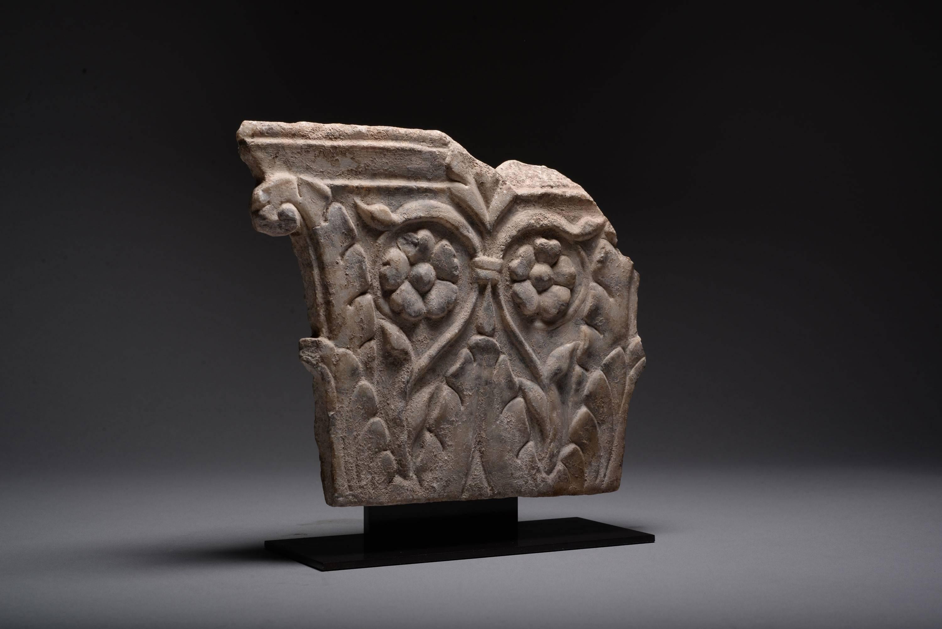 A fragment of a Roman pillaster, dating to the 2nd Century AD.

Carved from a piece of beautiful white marble and decorated profusely, with acanthus leaves, tendrils and rosettes.

Pillasters are decorative pillars and were used by the Romans to