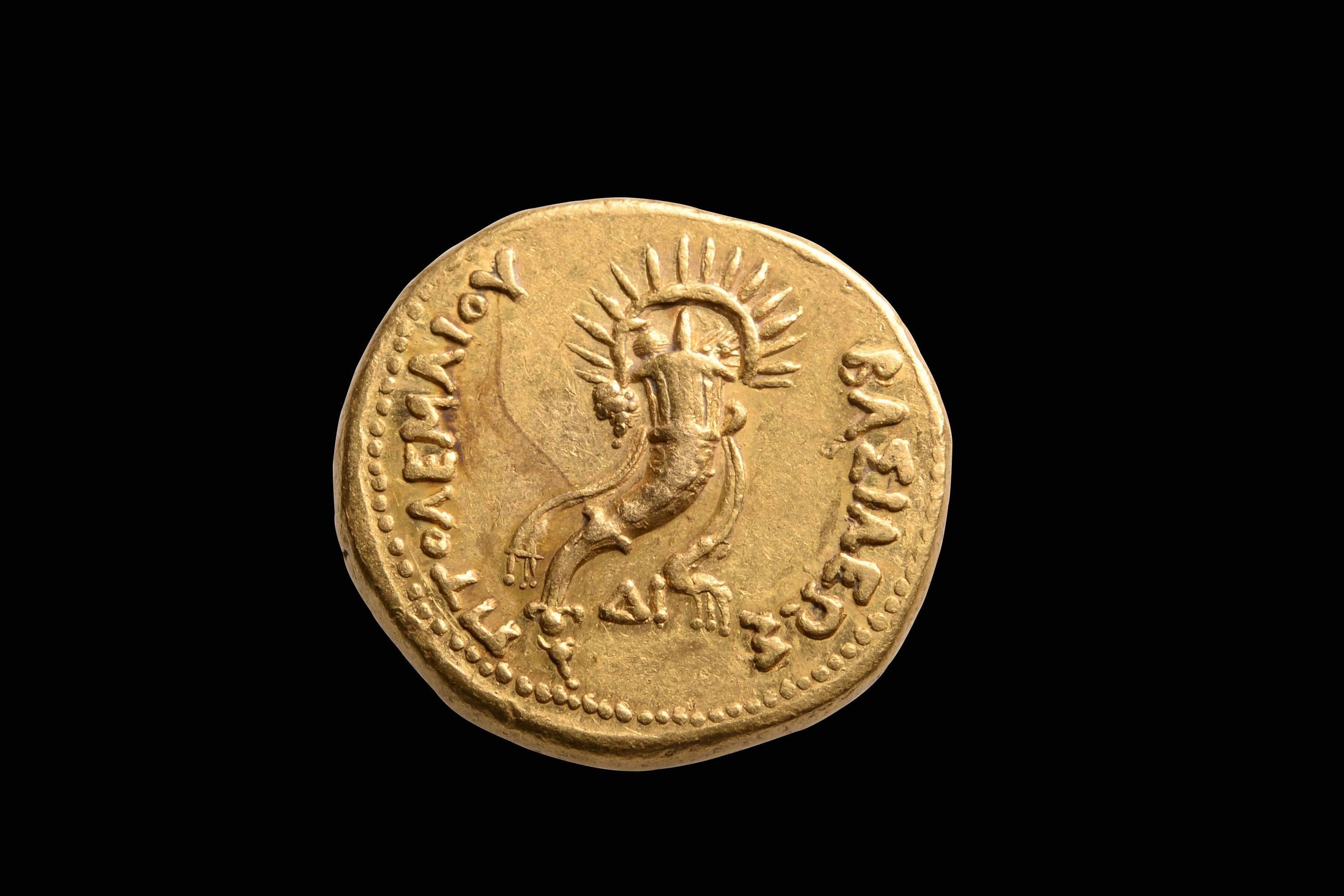 A superb, beautifully centred, lustrous example of one of the most impressive and valuable coins ever minted in the ancient world.

A solid gold Oktadrachm or Mnaïeion, issued under Ptolemy IV Philopator, in honour of his predecessor and father,