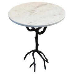 Tavolino in ferro e marmo; gambe in ferro a forma di radice; diametro 16" x altezza 22,5"