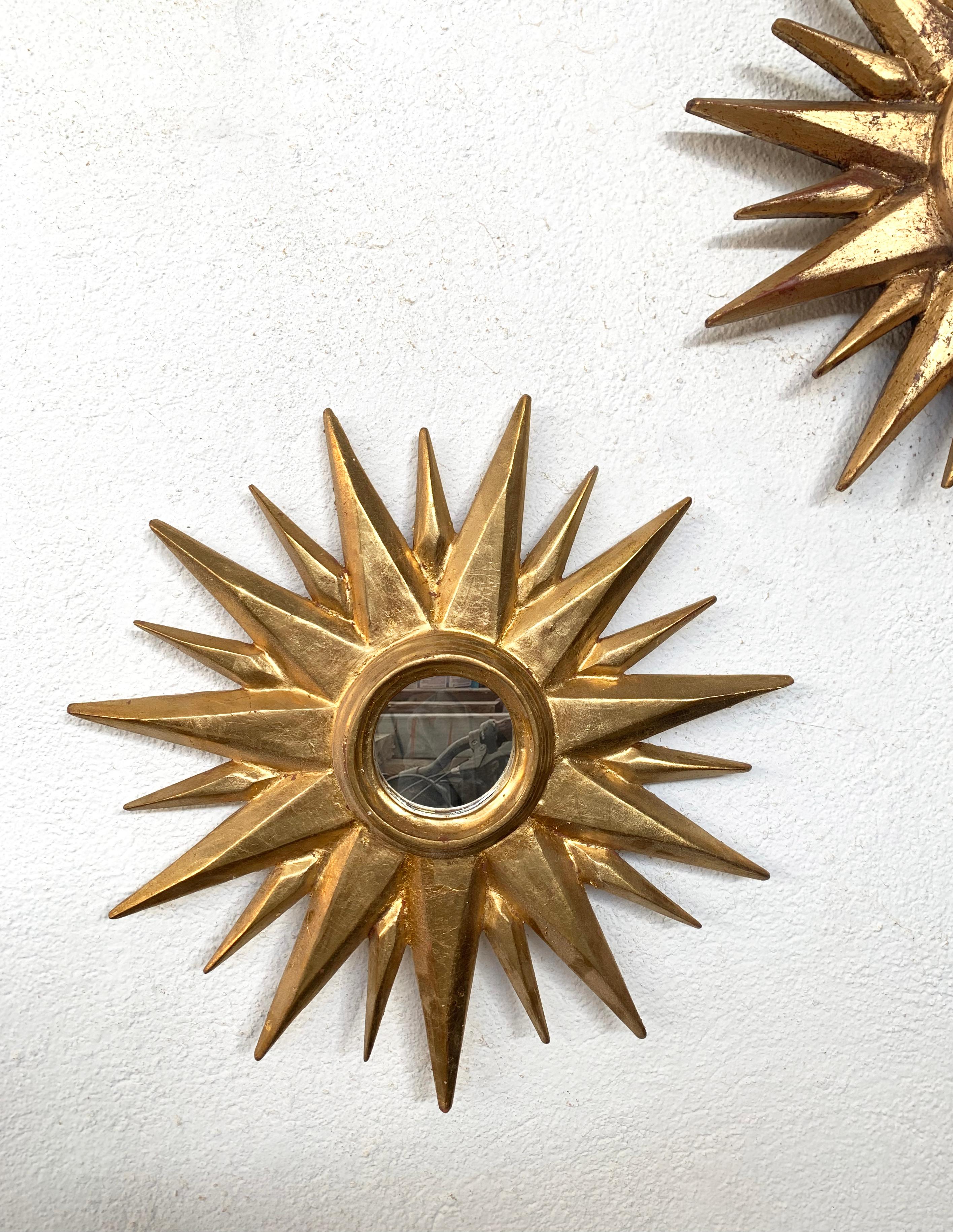 Spanish Late 20th Century Sunburst Carved Golden Mirrors, a Pair For Sale